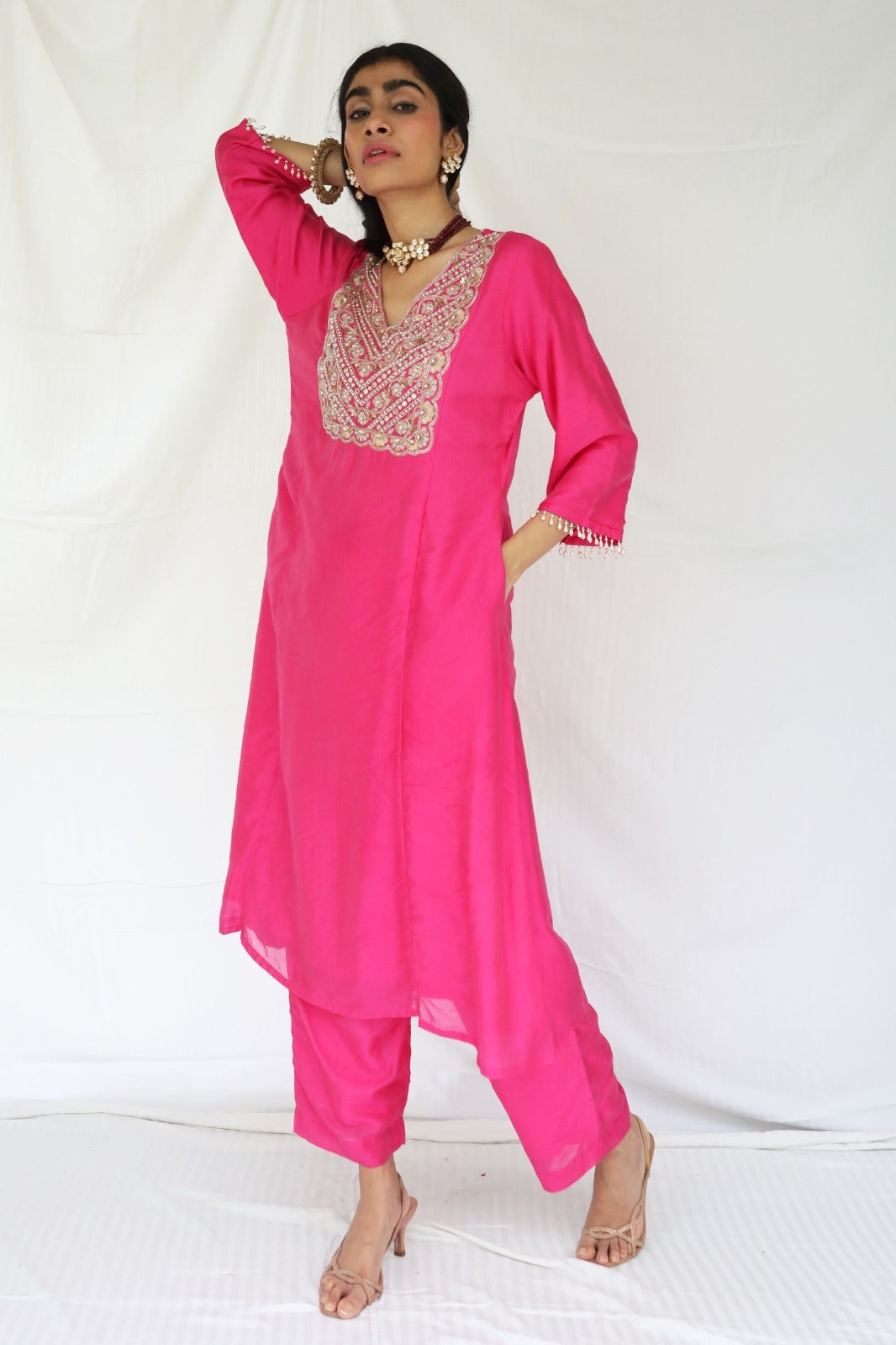 Rani pink chanderi kurta set with a hand embroidered yoke and handwoven dupatta