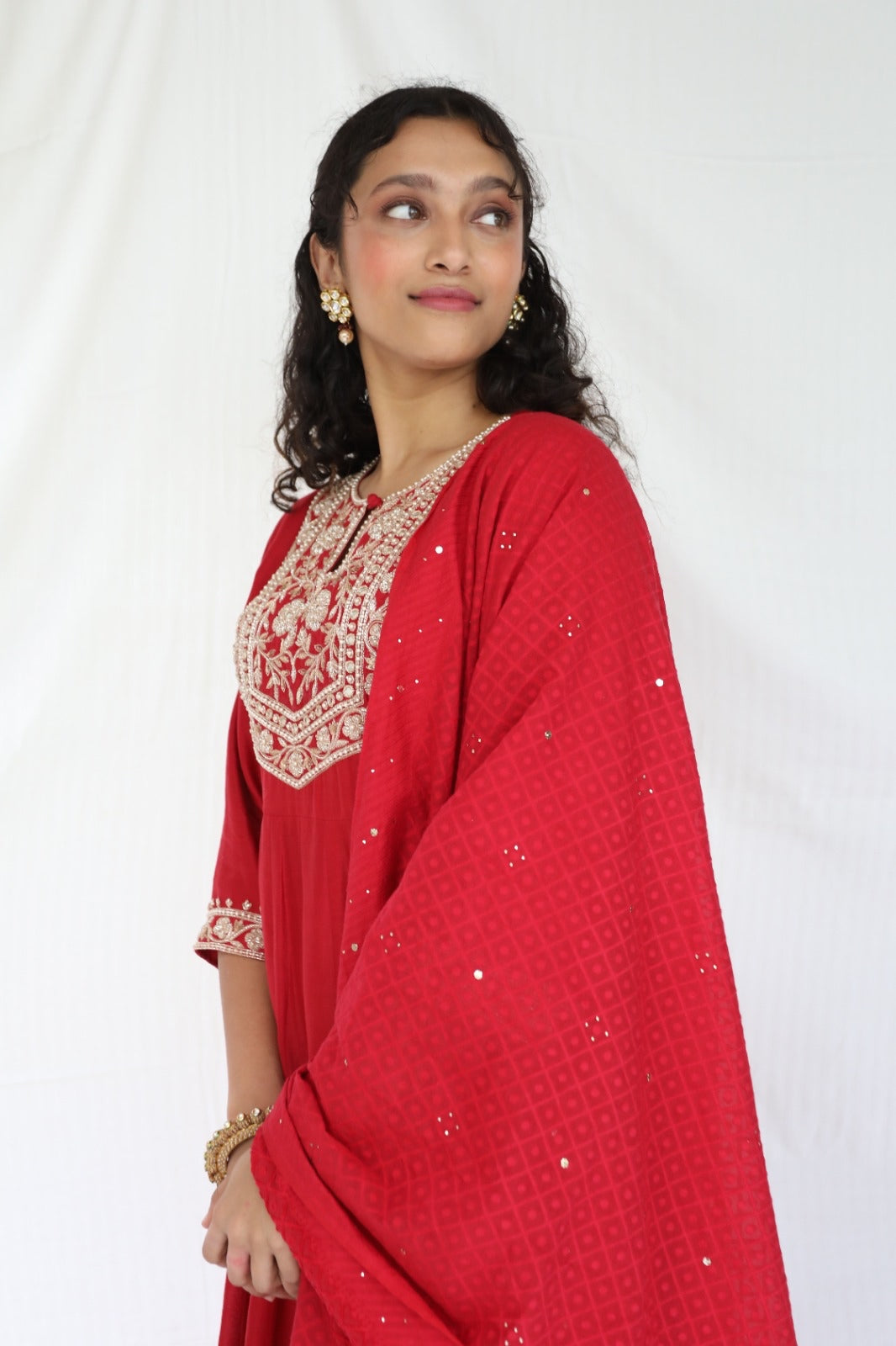 Deep red hand embroidered chanderi anarkali with a mukaish dupatta