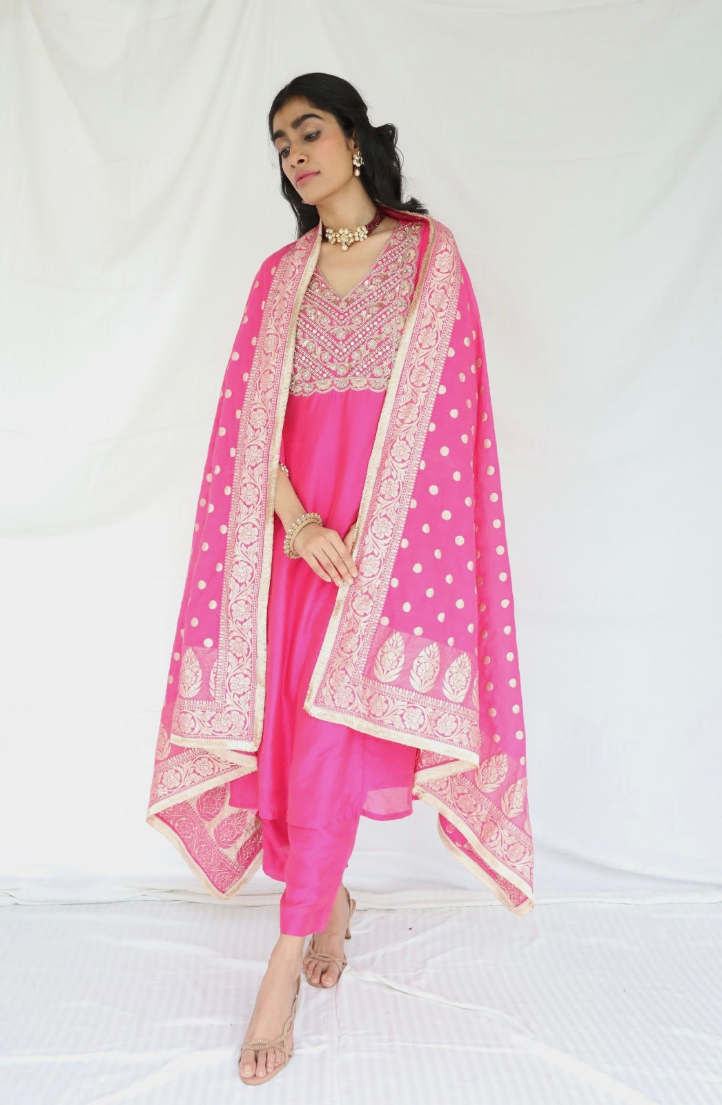 Rani pink chanderi kurta set with a hand embroidered yoke and handwoven dupatta