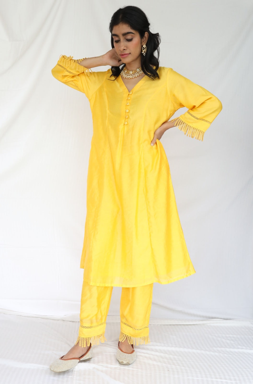 Sunny yellow chanderi kurta set with intricate detailing and an ombré dyed organza dupatta