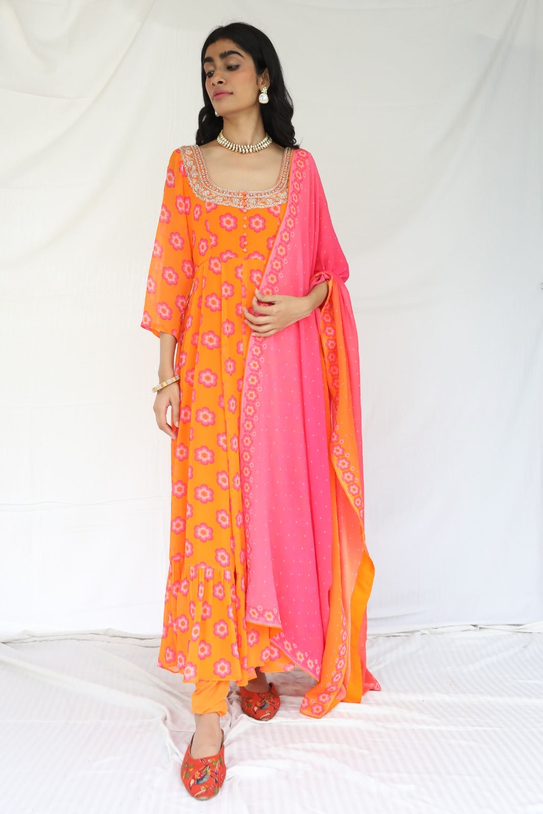 Orange pink printed anarkali set with a hand embroidered yoke and ombre dupatta