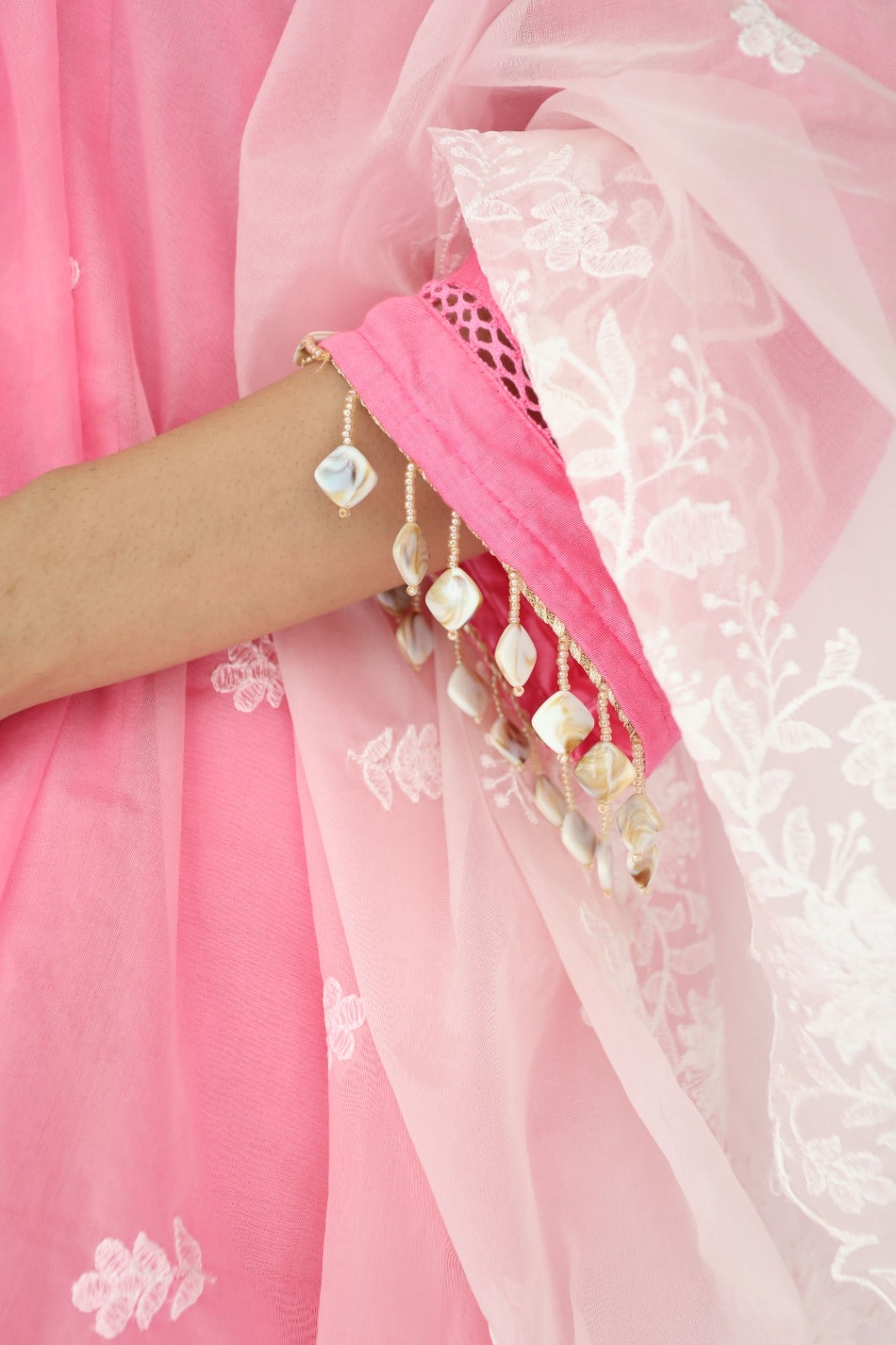 Pink chanderi kurta set with intricate lace and shell detailing with an ombré dyed organza dupatta