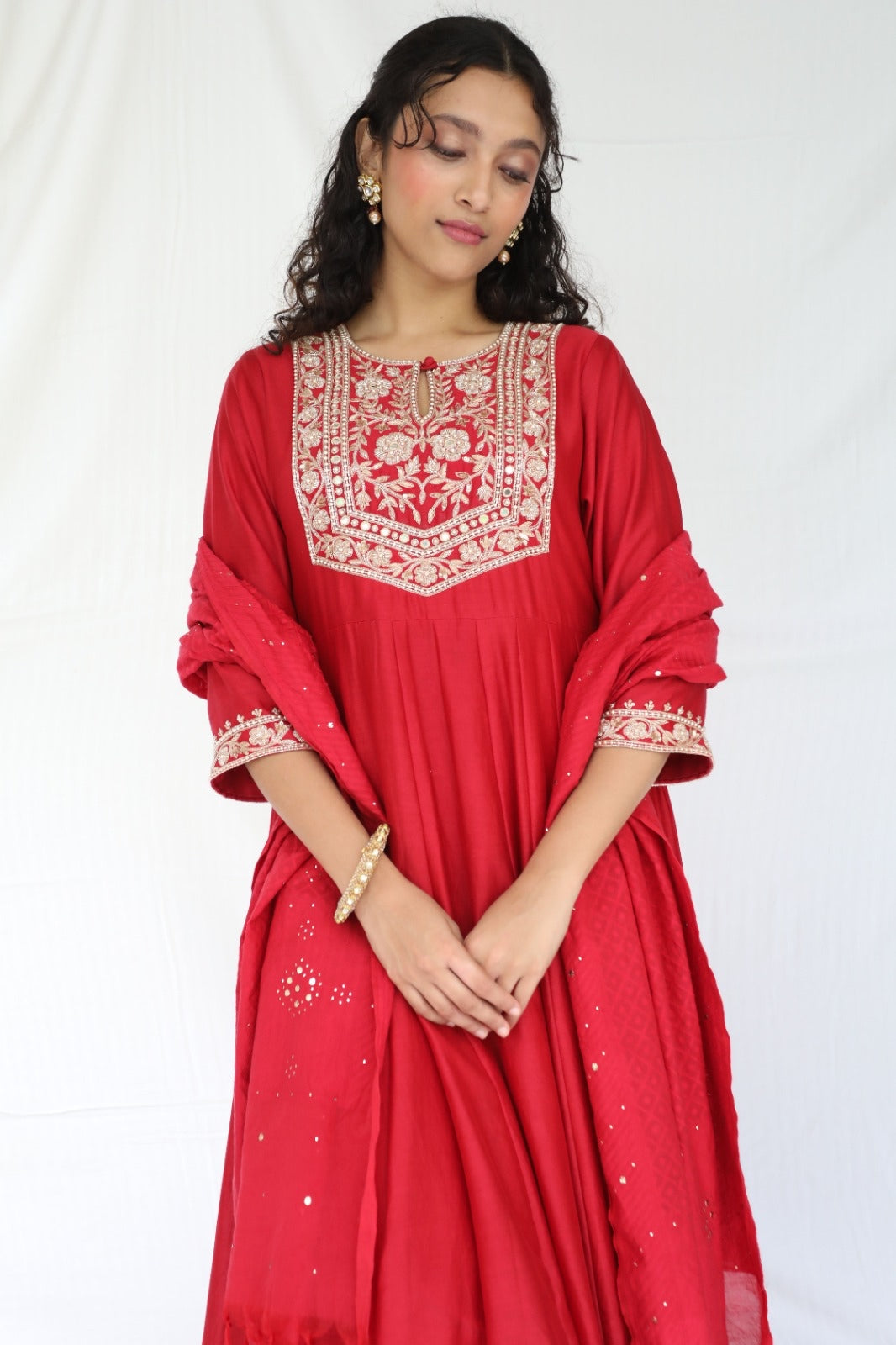 Deep red hand embroidered chanderi anarkali with a mukaish dupatta