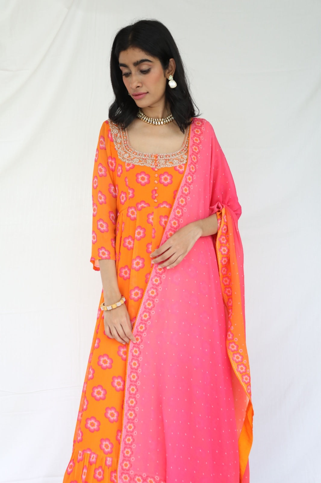 Orange pink printed anarkali set with a hand embroidered yoke and ombre dupatta