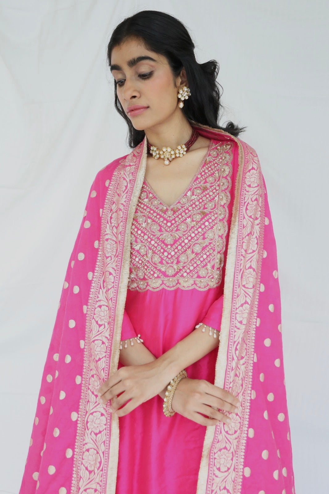 Rani pink chanderi kurta set with a hand embroidered yoke and handwoven dupatta