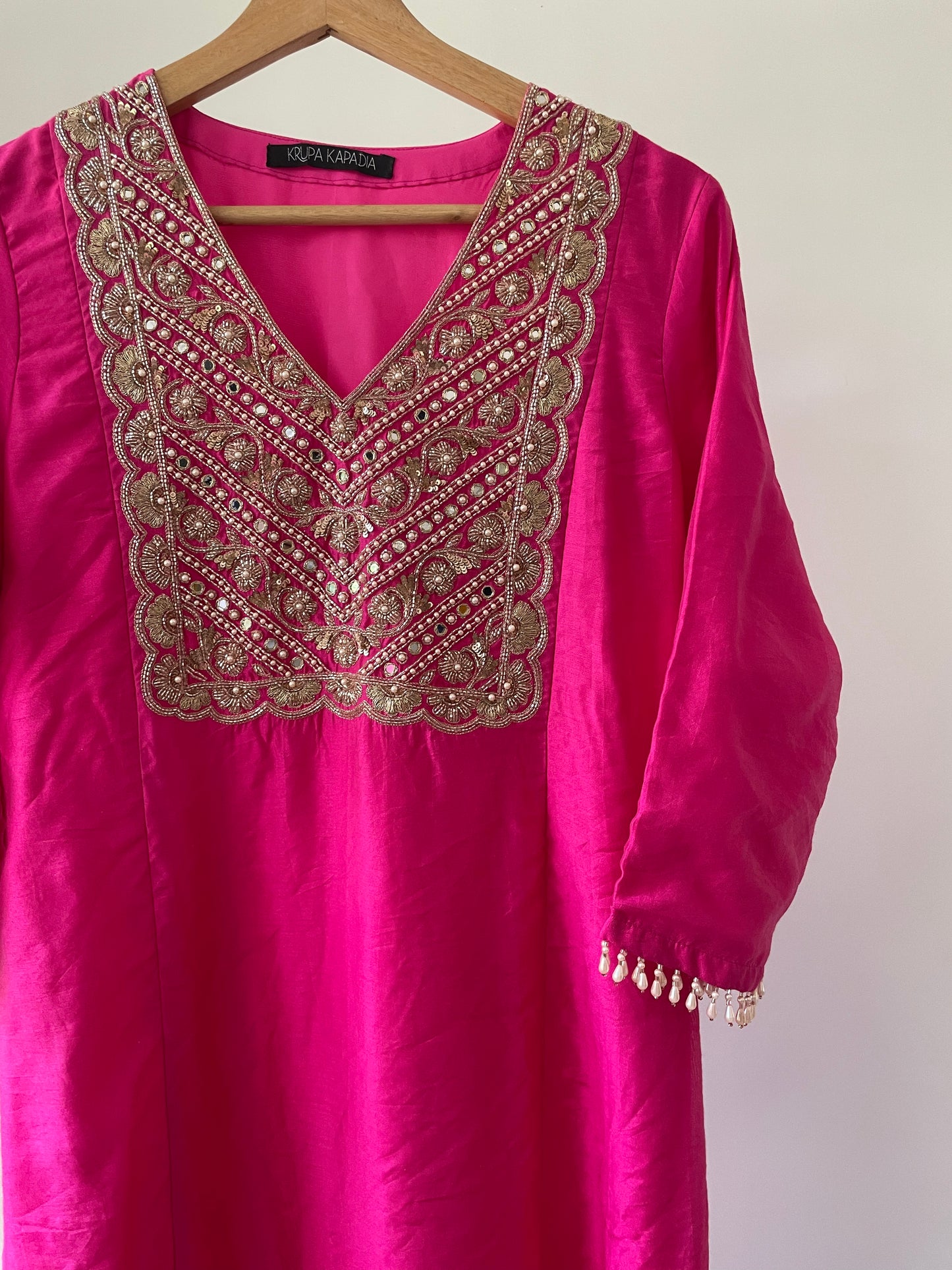 Rani pink chanderi kurta set with a hand embroidered yoke and handwoven dupatta