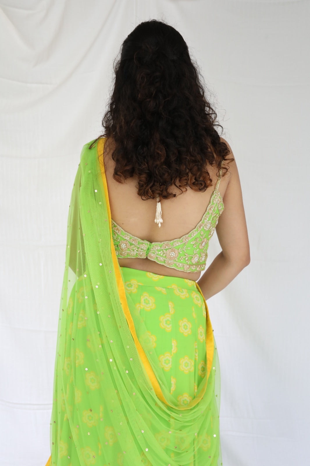 Lime green lehenga set with a hand embroidered blouse and dupatta