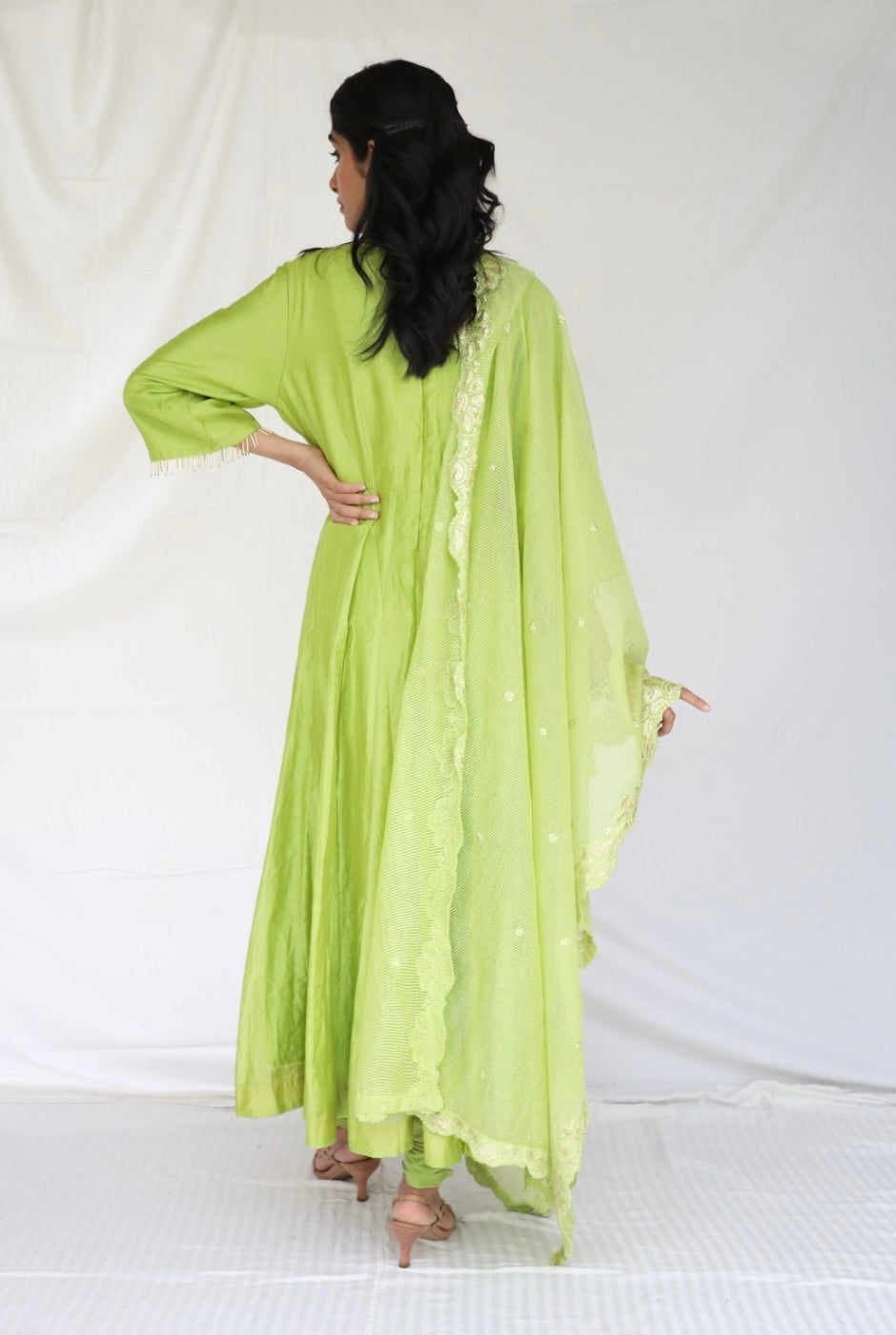 Dusty green chanderi anarkali with a hand embroidered yoke and embellished dupatta