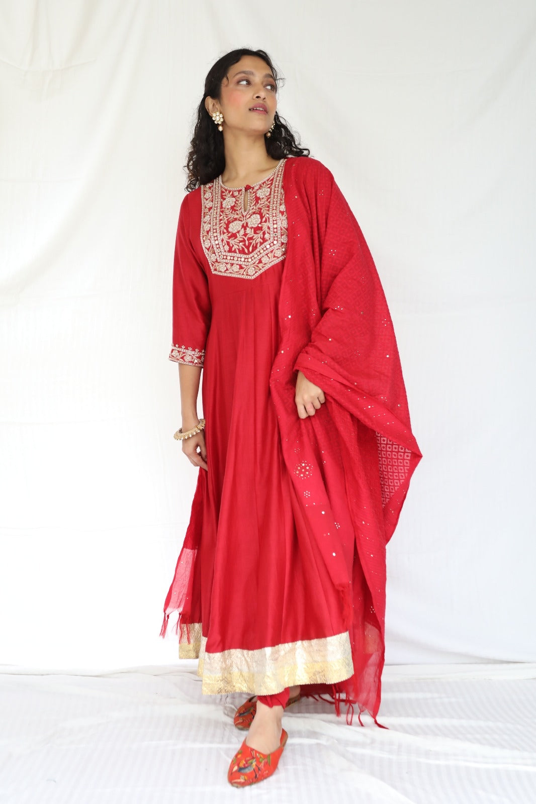 Deep red hand embroidered chanderi anarkali with a mukaish dupatta