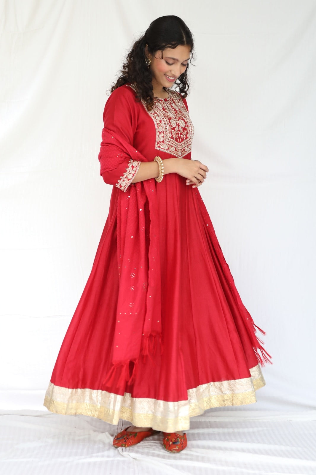 Deep red hand embroidered chanderi anarkali with a mukaish dupatta