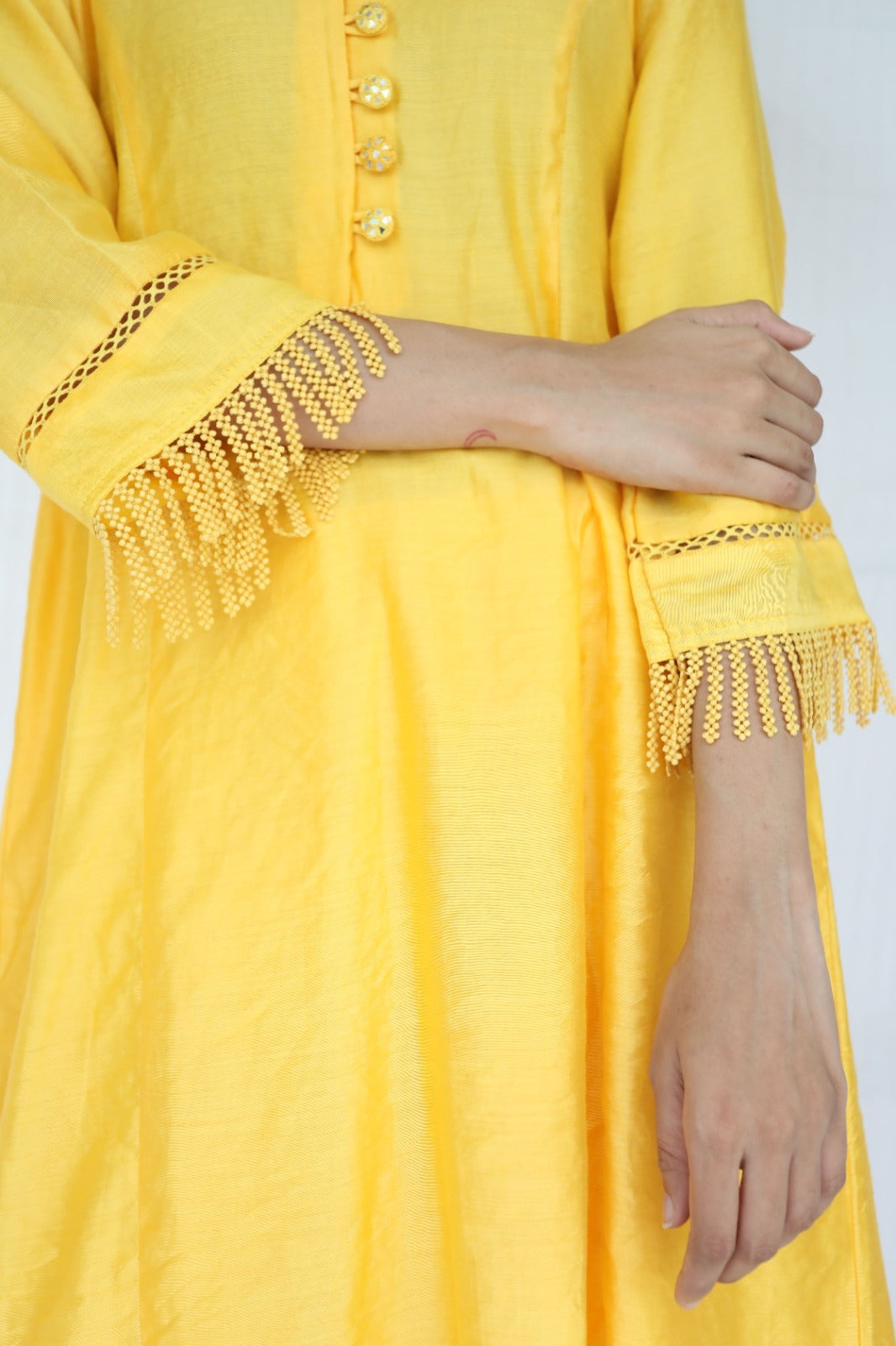 Sunny yellow chanderi kurta set with intricate detailing and an ombré dyed organza dupatta