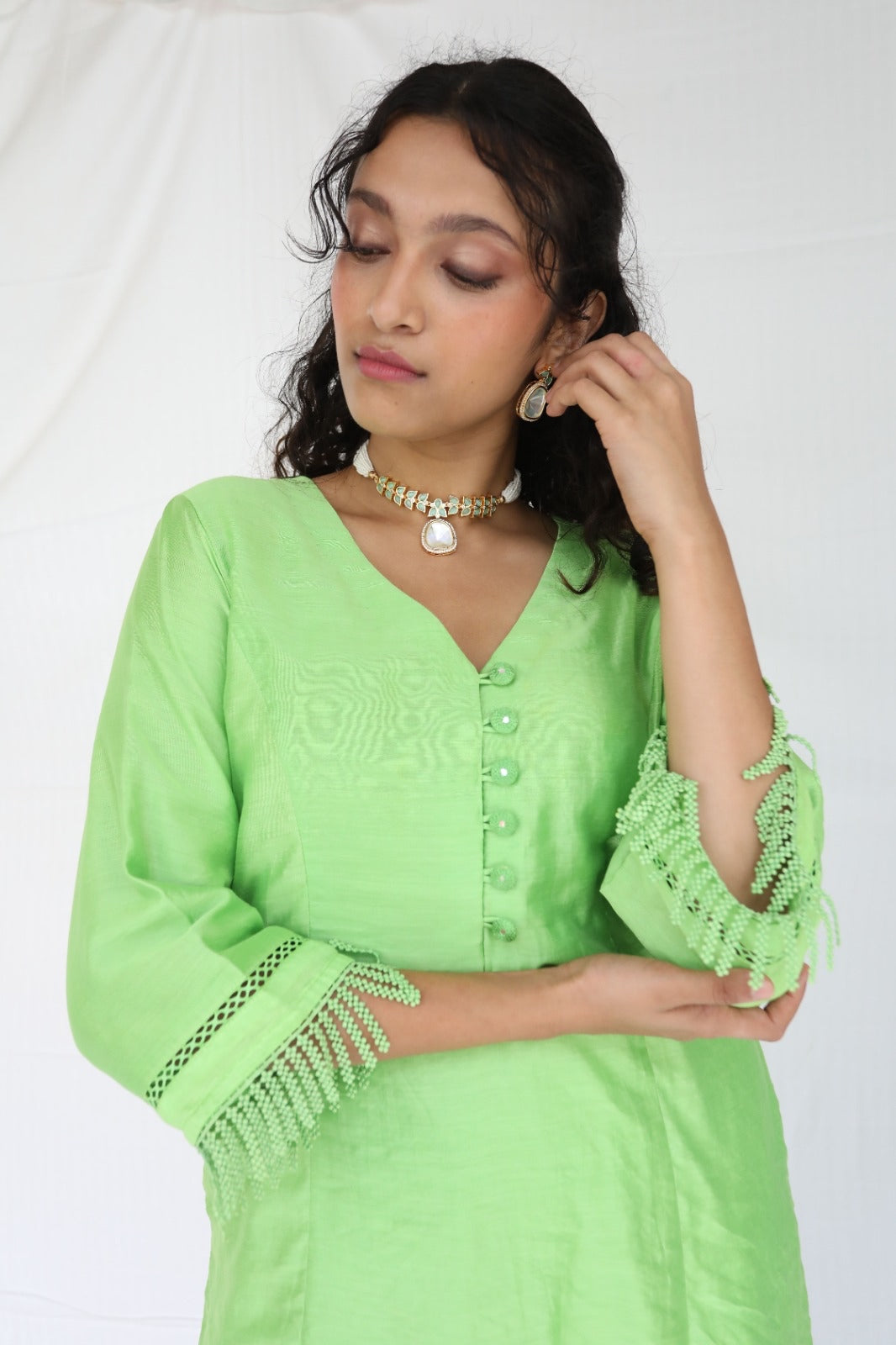 Mint green chanderi kurta set with intricate lace and shell detailing with an ombré dyed organza cutwork dupatta