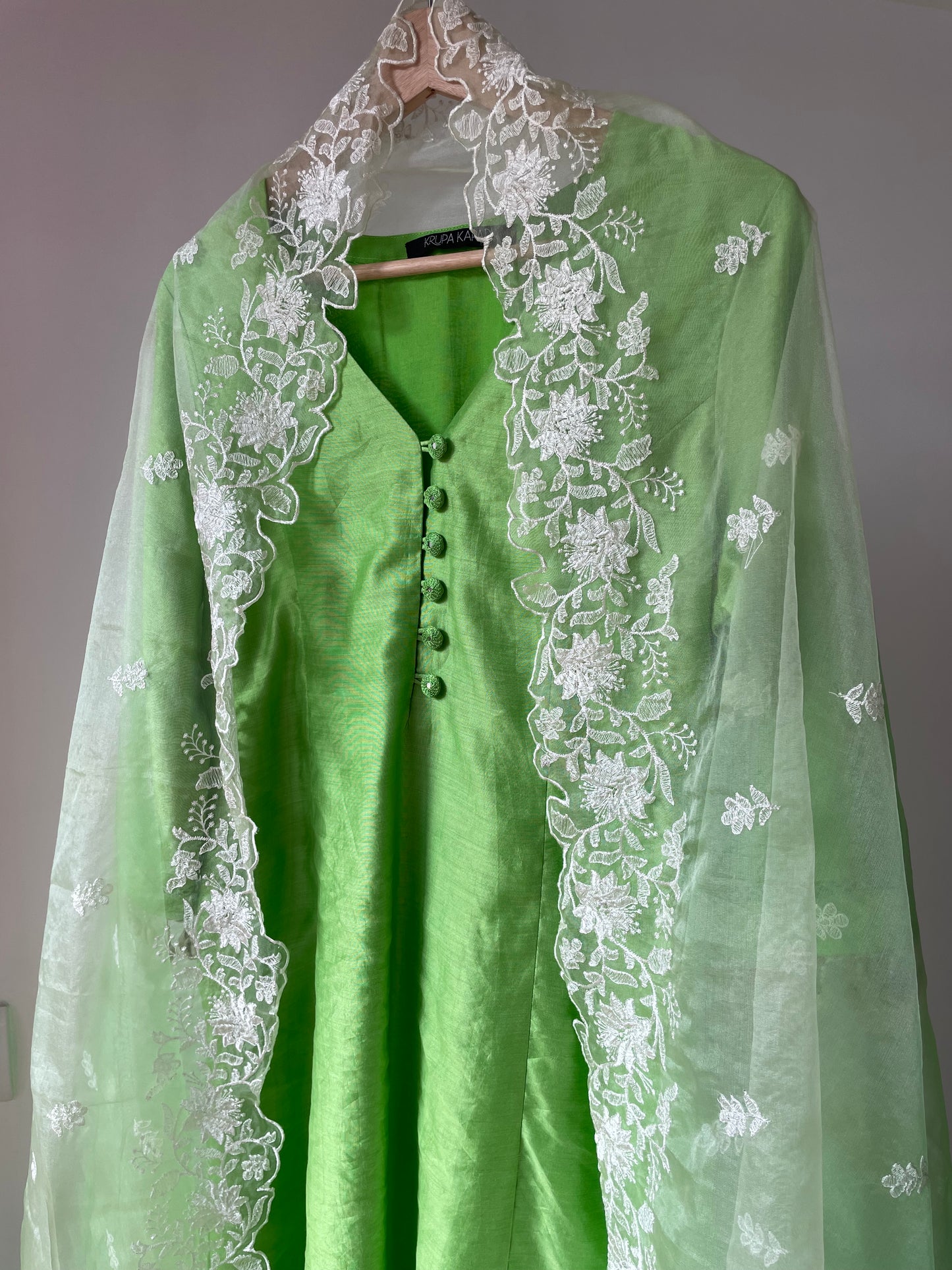 Mint green chanderi kurta set with intricate lace and shell detailing with an ombré dyed organza cutwork dupatta