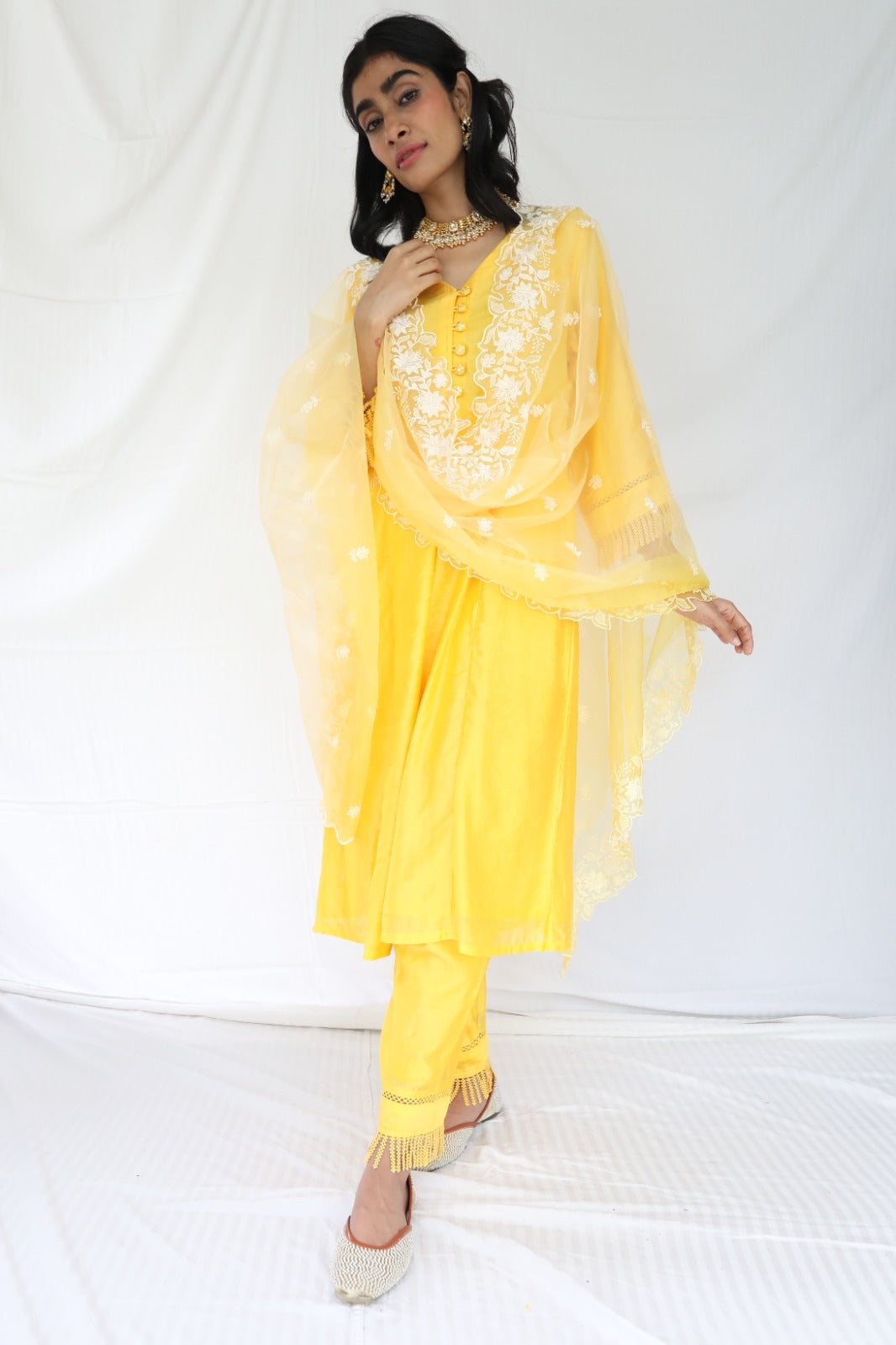 Sunny yellow chanderi kurta set with intricate detailing and an ombré dyed organza dupatta