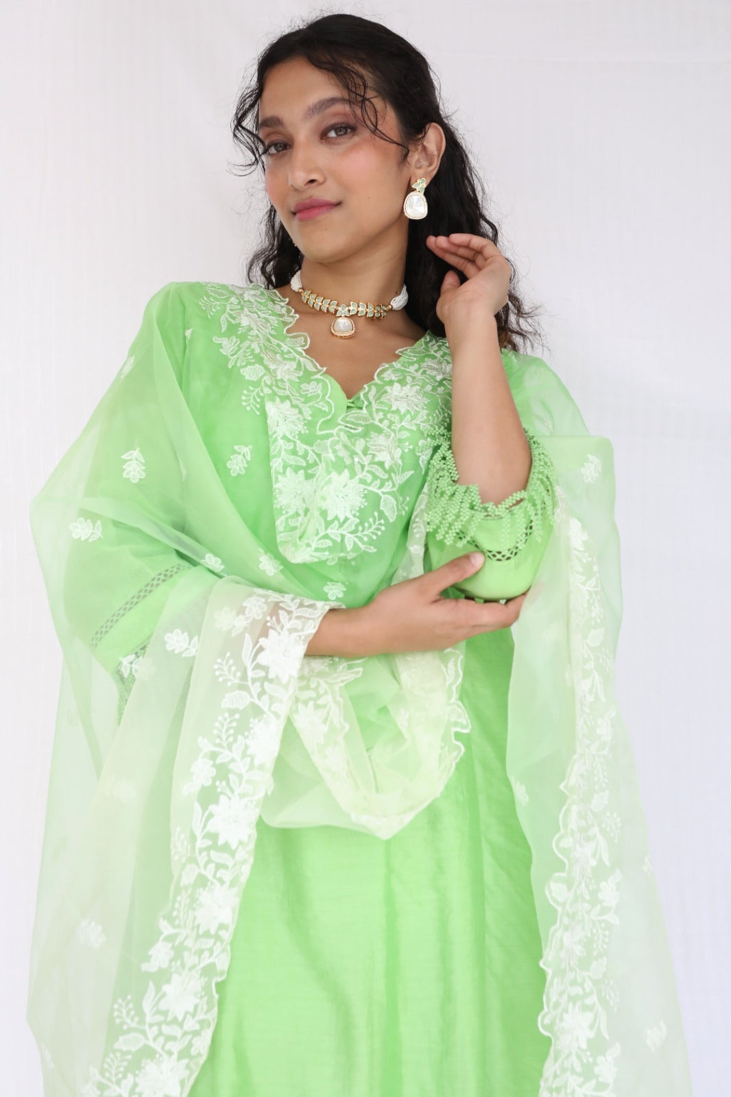 Mint green chanderi kurta set with intricate lace and shell detailing with an ombré dyed organza cutwork dupatta