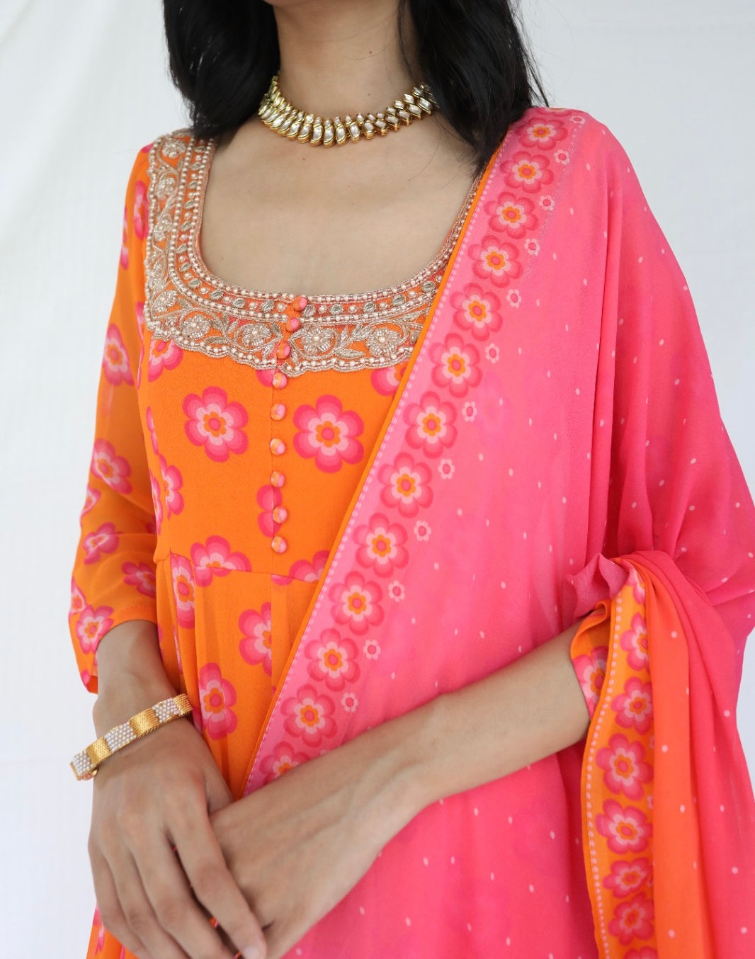 Orange pink printed anarkali set with a hand embroidered yoke and ombre dupatta