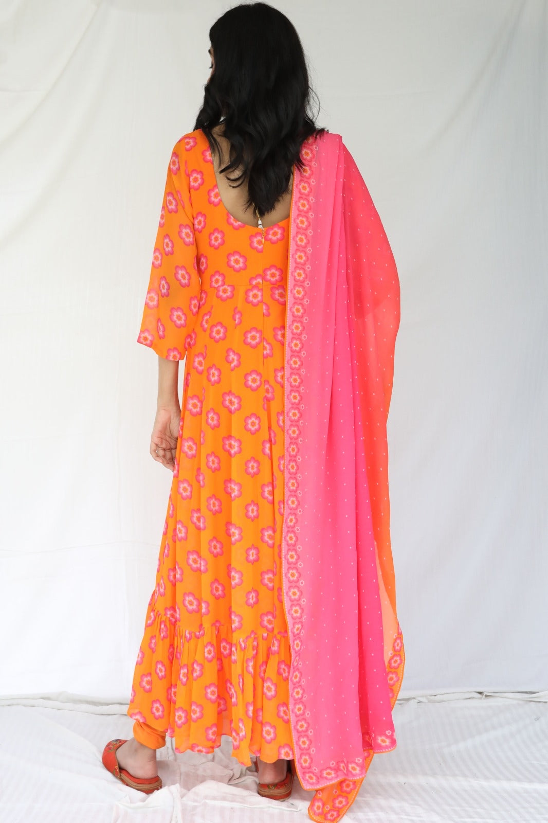 Orange pink printed anarkali set with a hand embroidered yoke and ombre dupatta