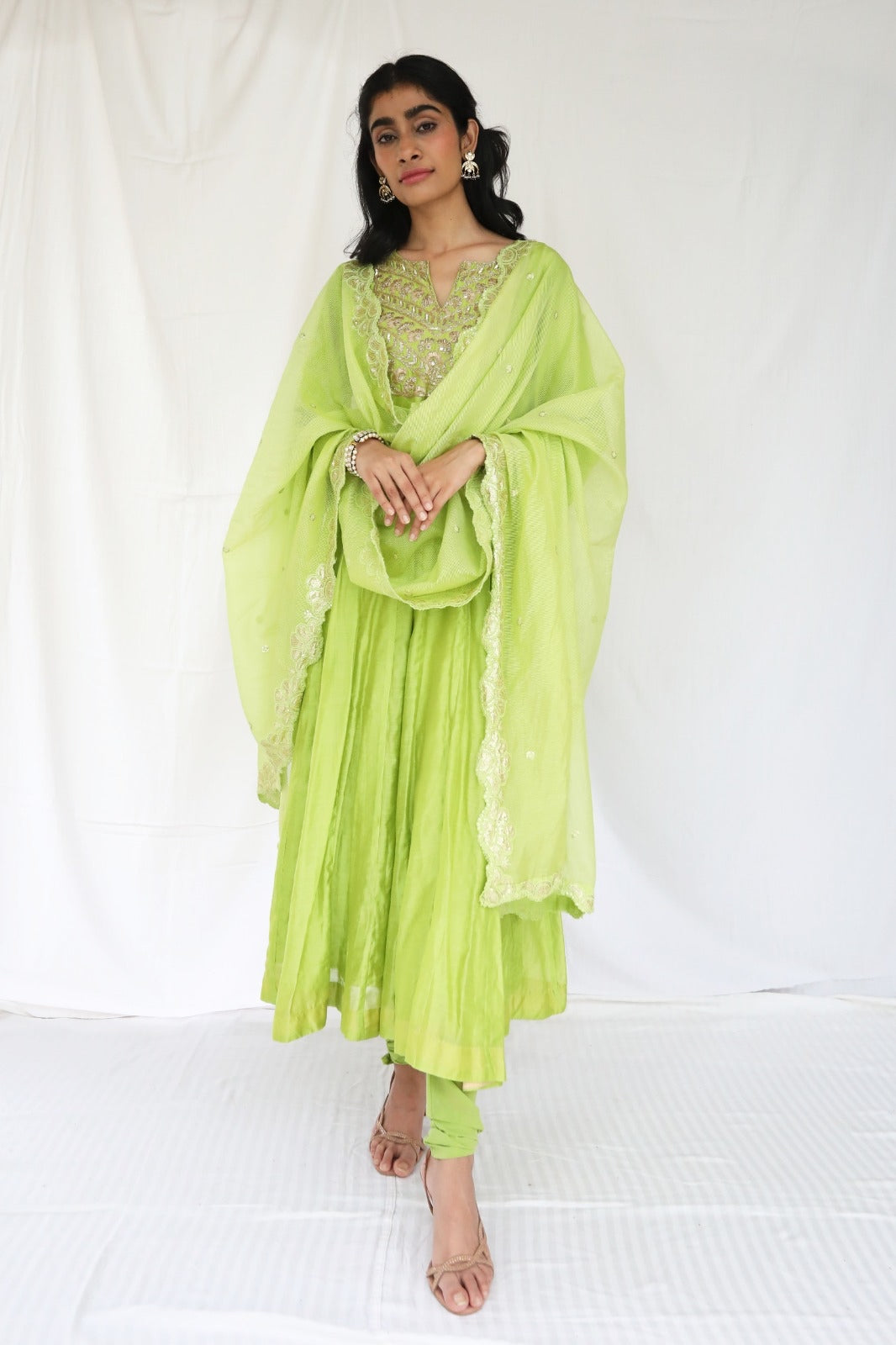 Dusty green chanderi anarkali with a hand embroidered yoke and embellished dupatta