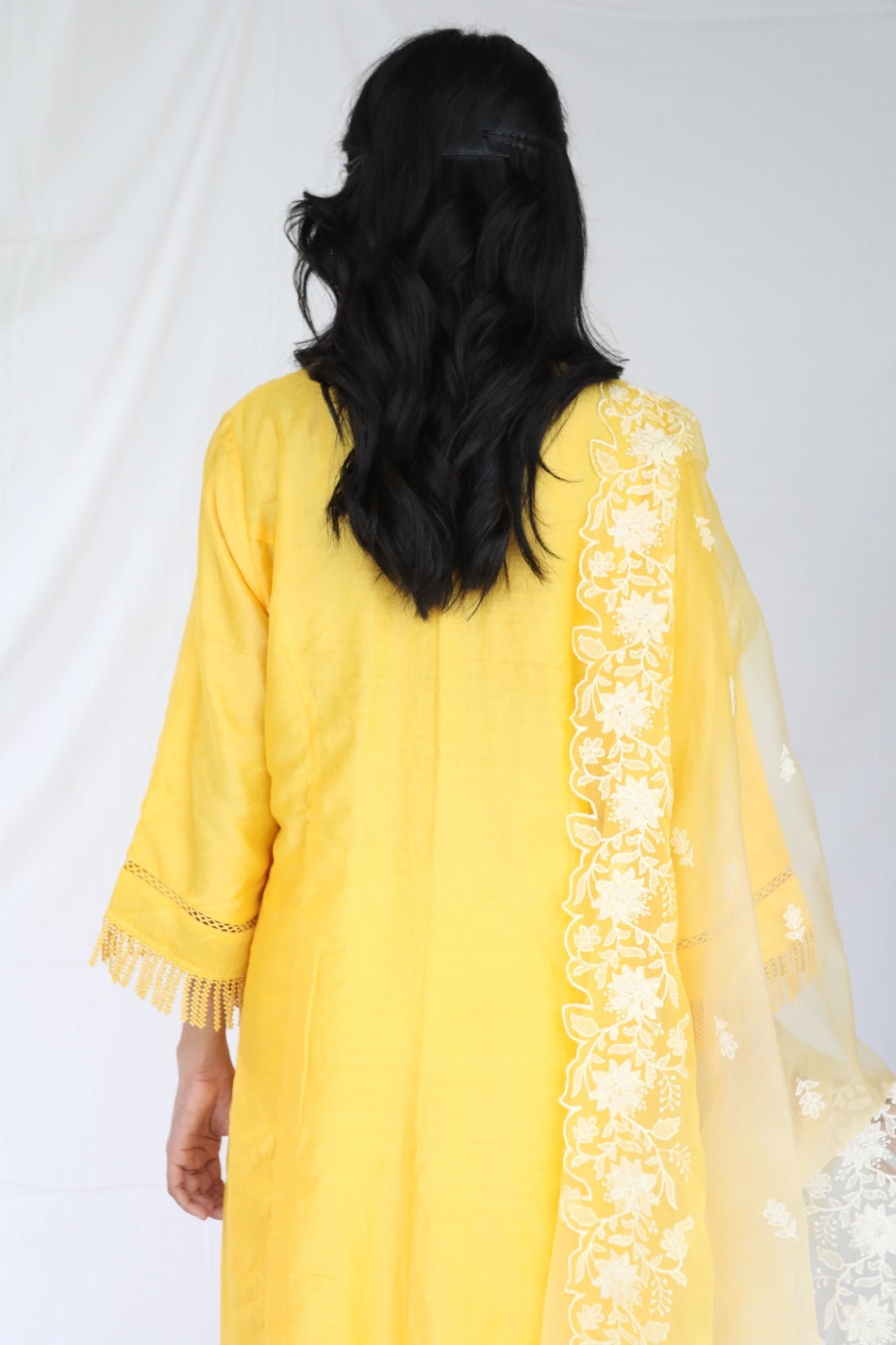 Sunny yellow chanderi kurta set with intricate detailing and an ombré dyed organza dupatta