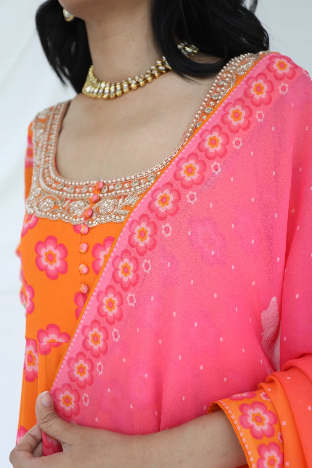 Orange pink printed anarkali set with a hand embroidered yoke and ombre dupatta