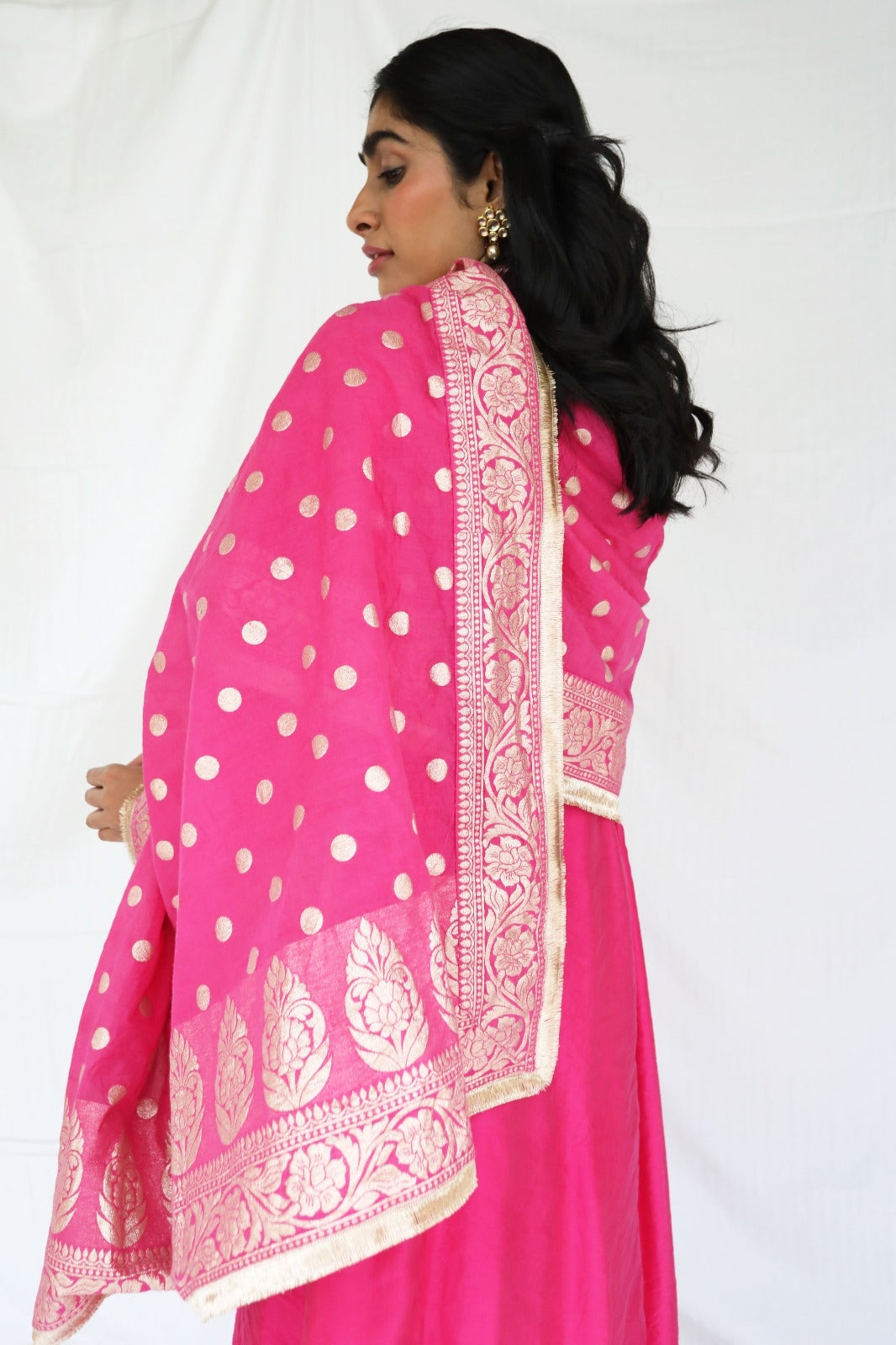 Rani pink chanderi kurta set with a hand embroidered yoke and handwoven dupatta