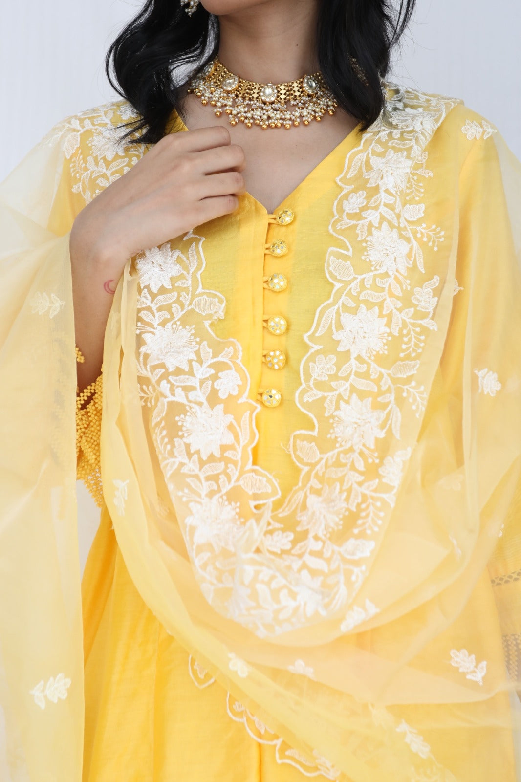 Sunny yellow chanderi kurta set with intricate detailing and an ombré dyed organza dupatta