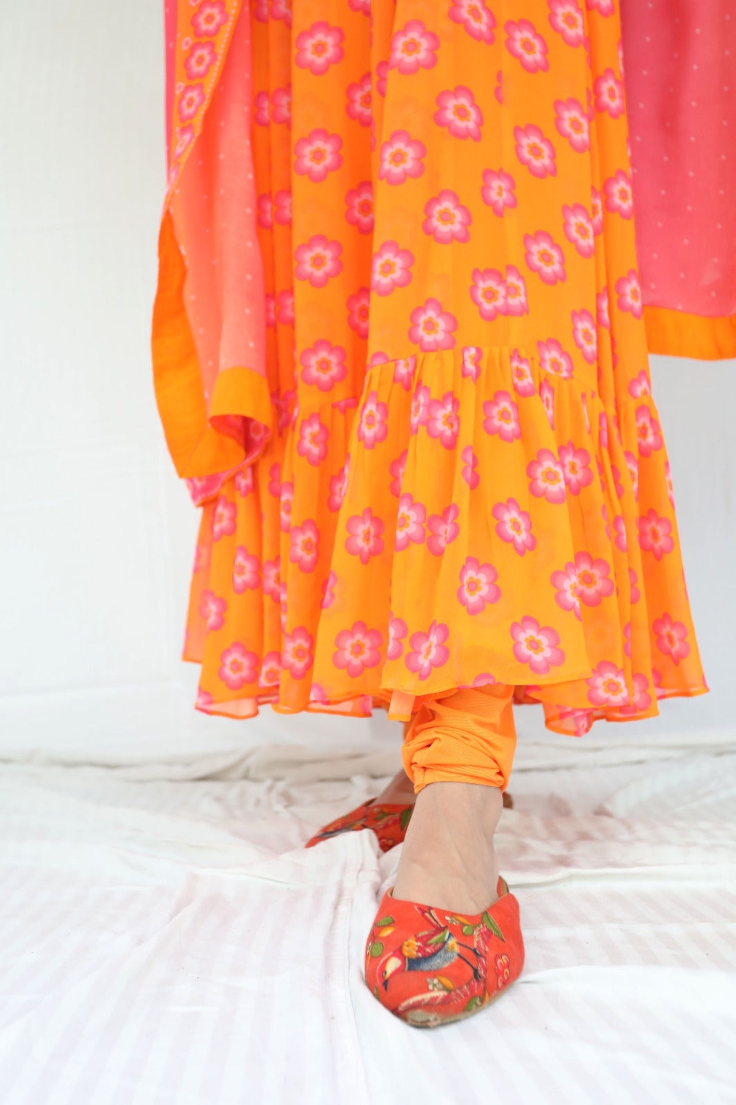 Orange pink printed anarkali set with a hand embroidered yoke and ombre dupatta