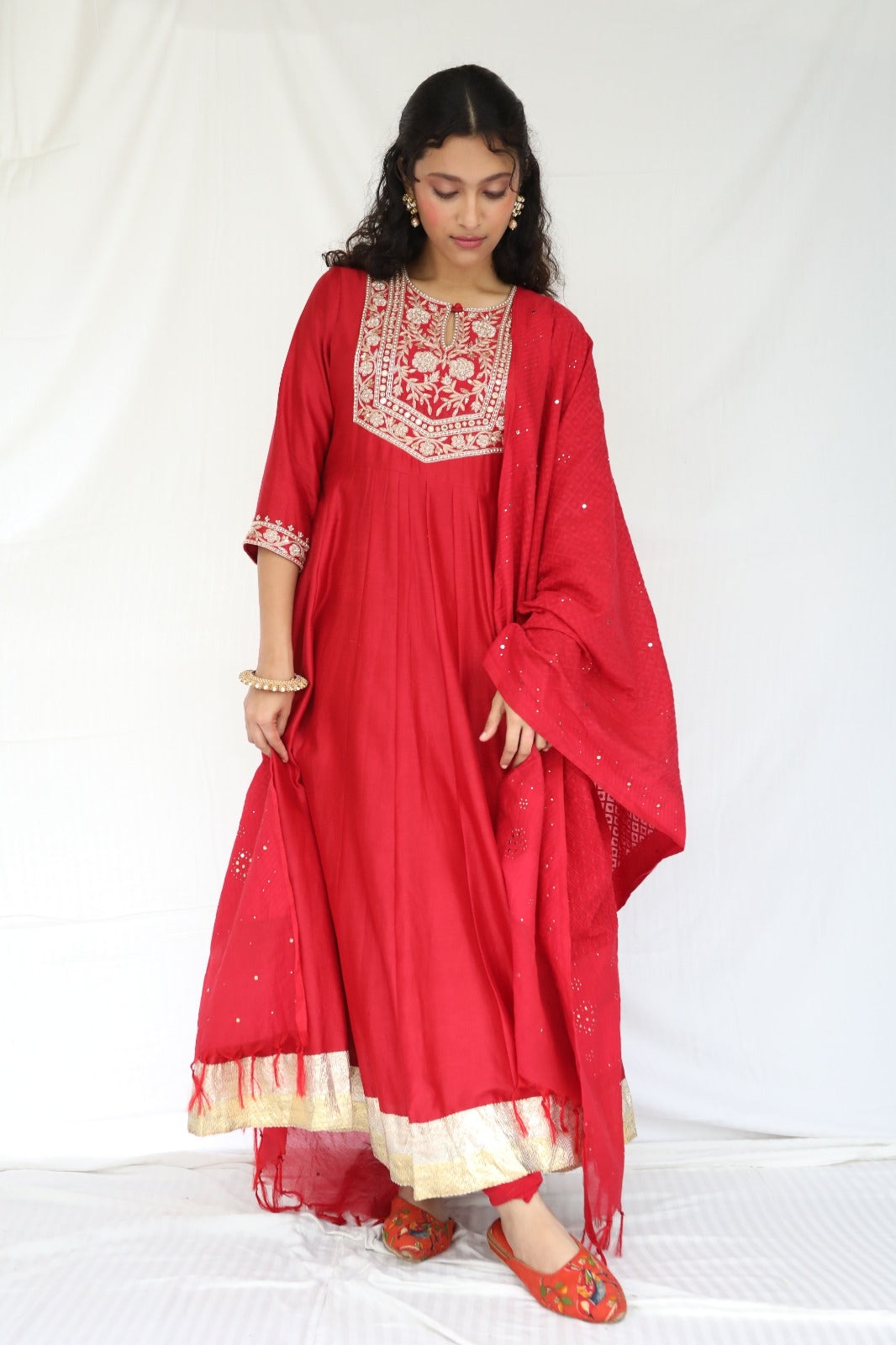 Deep red hand embroidered chanderi anarkali with a mukaish dupatta