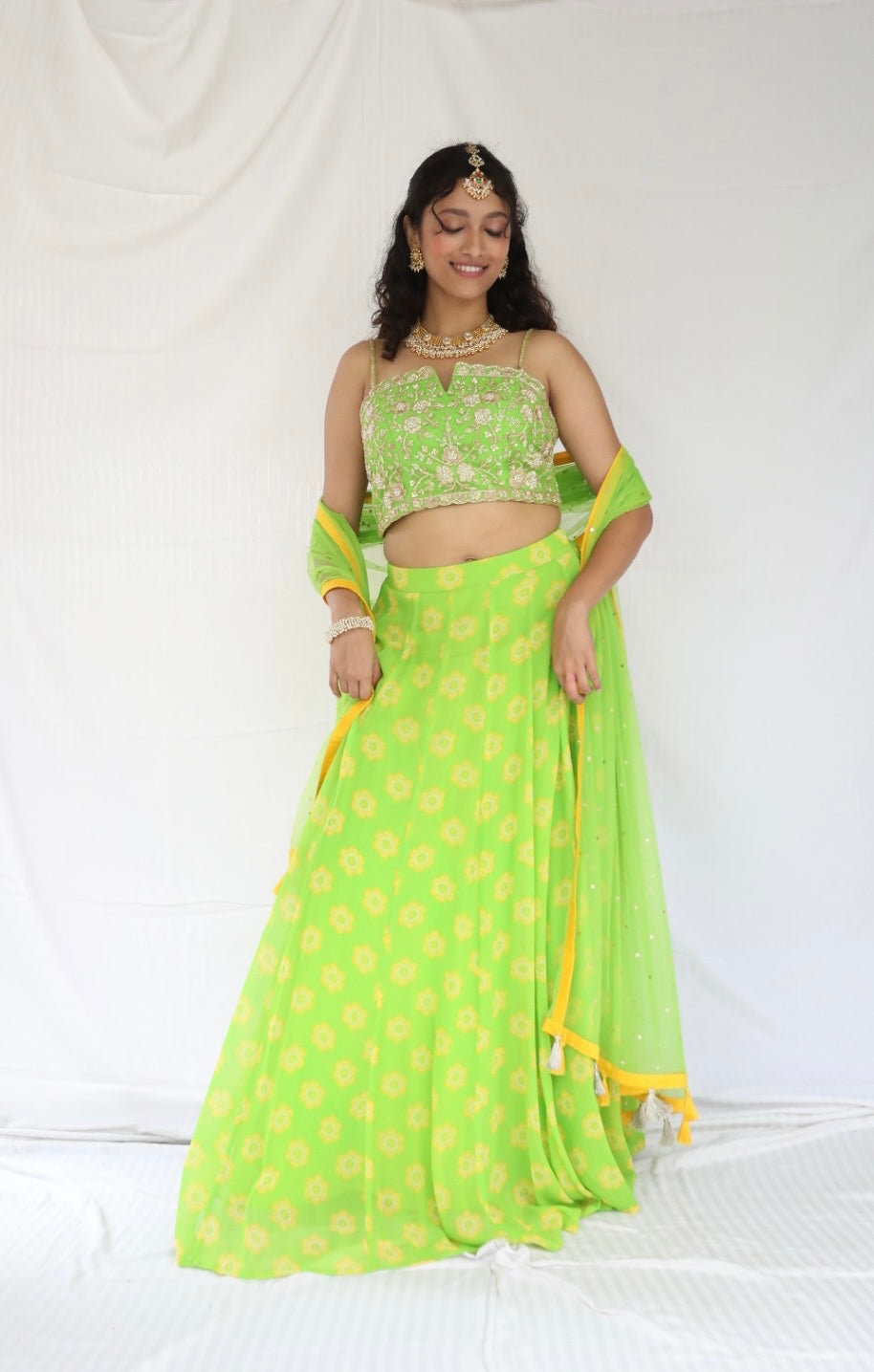 Lime green lehenga set with a hand embroidered blouse and dupatta