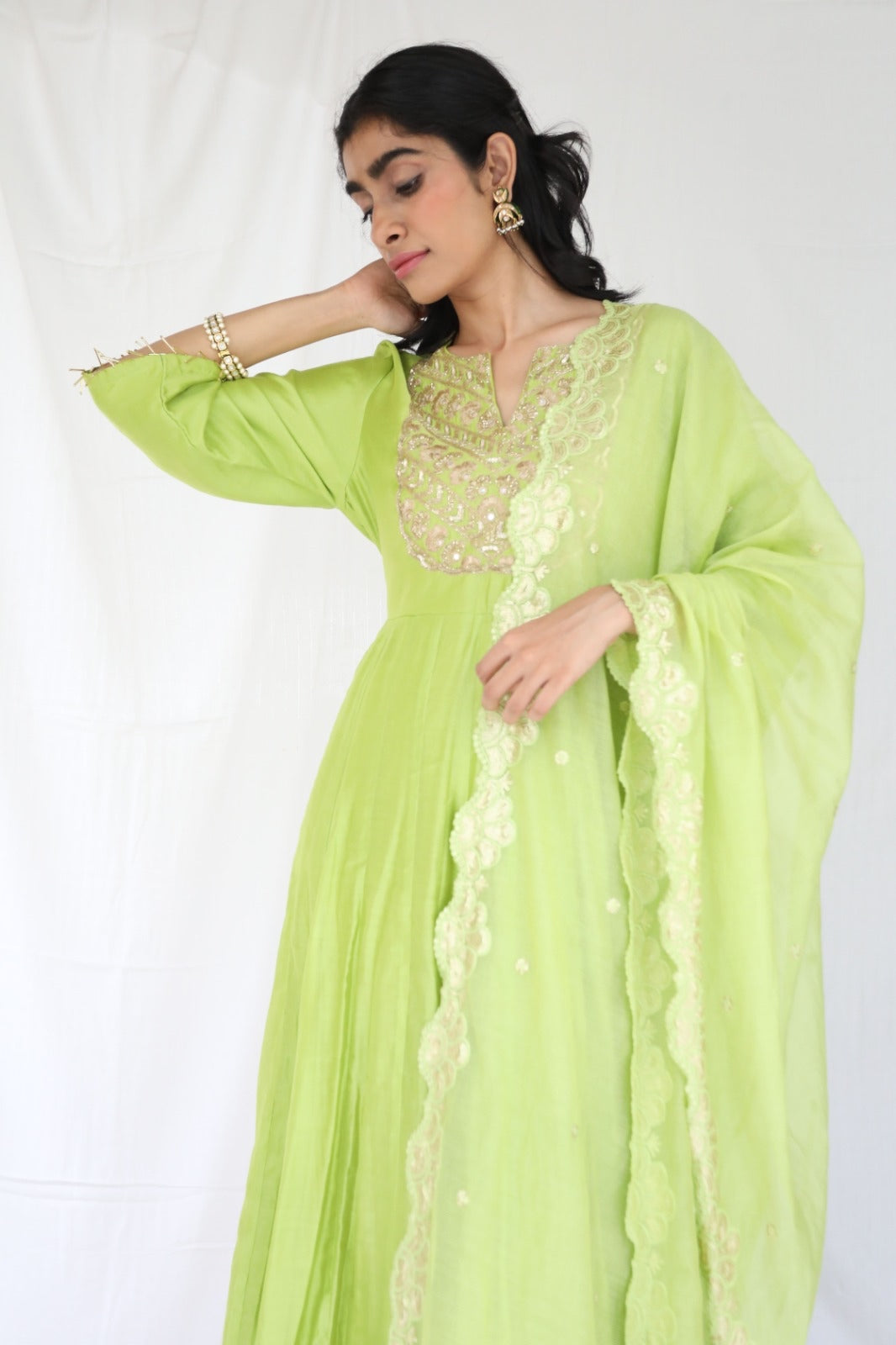 Dusty green chanderi anarkali with a hand embroidered yoke and embellished dupatta