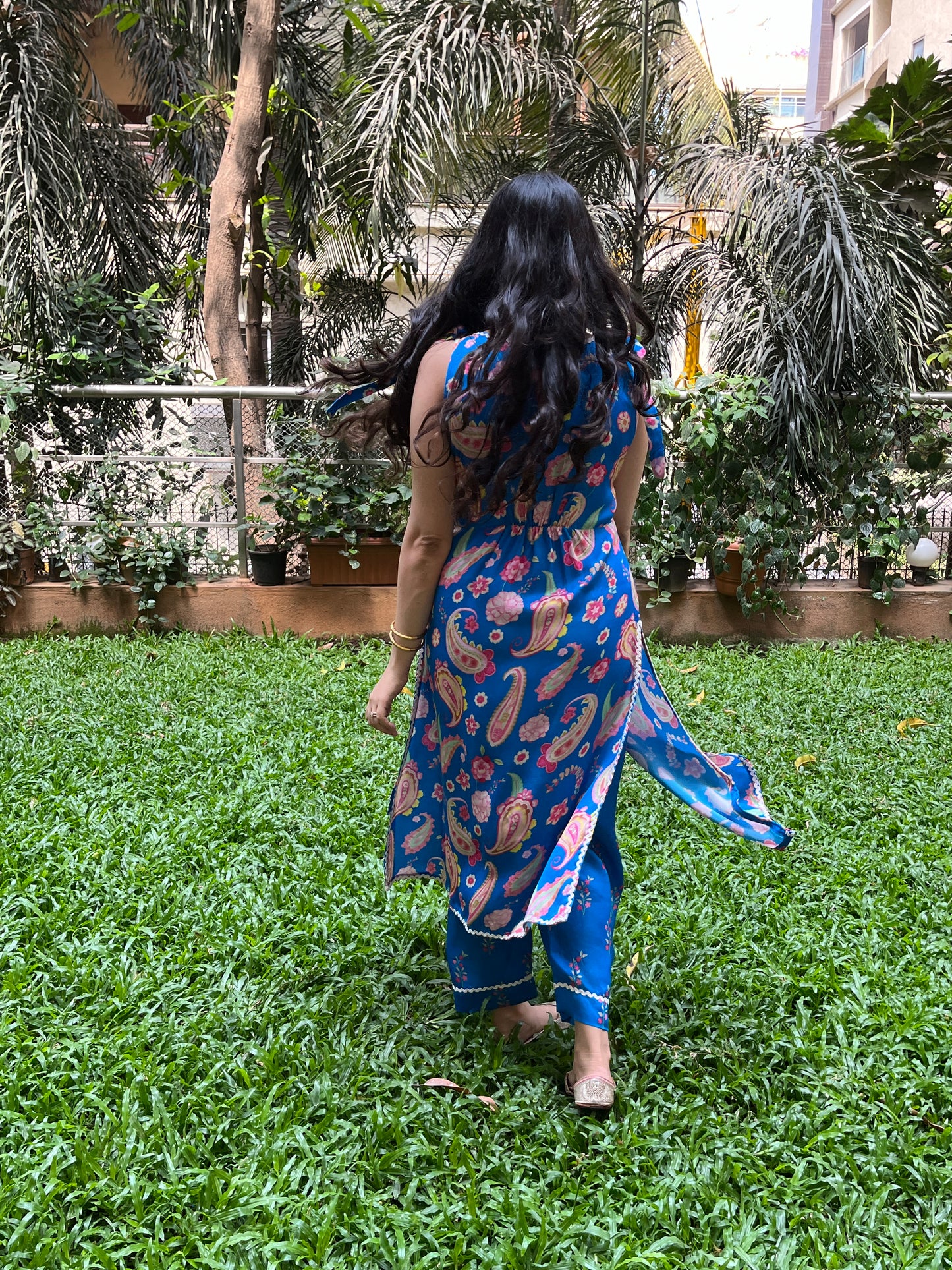 Peacock blue paisley printed kurta and floral printed pyjama pants with intricate lace detailing