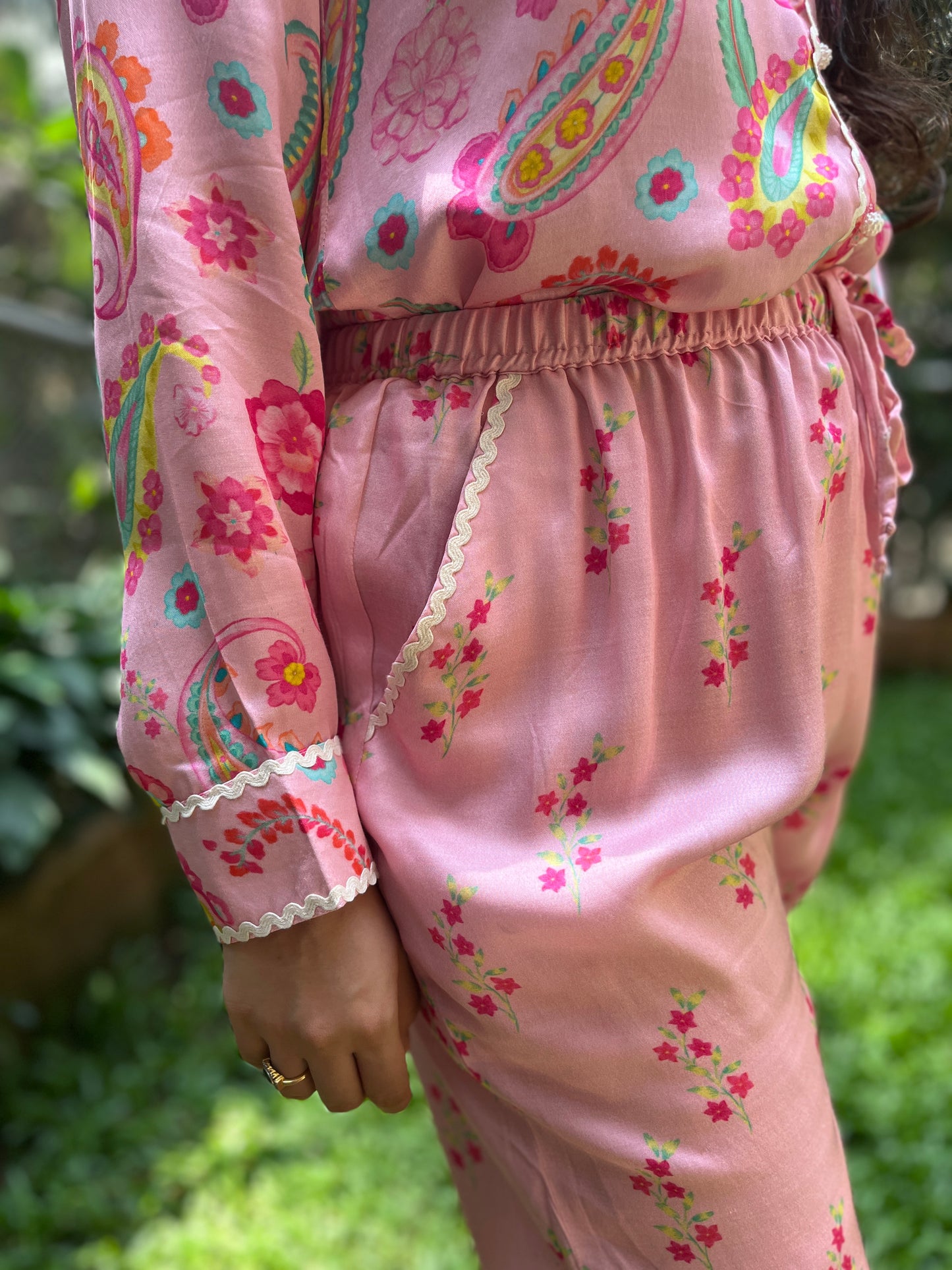 Baby pink paisley printed shirt and floral printed pants with intricate lace detailing