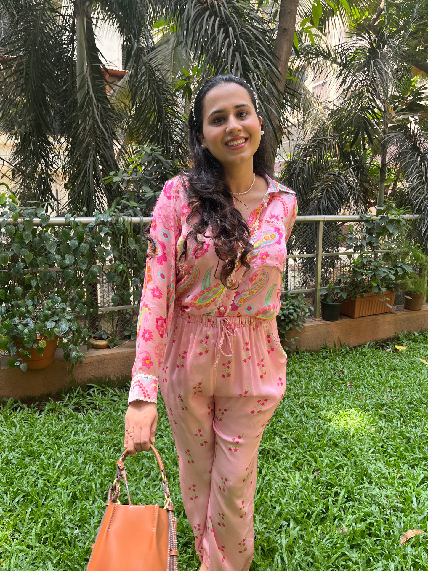 Baby pink paisley printed shirt and floral printed pants with intricate lace detailing