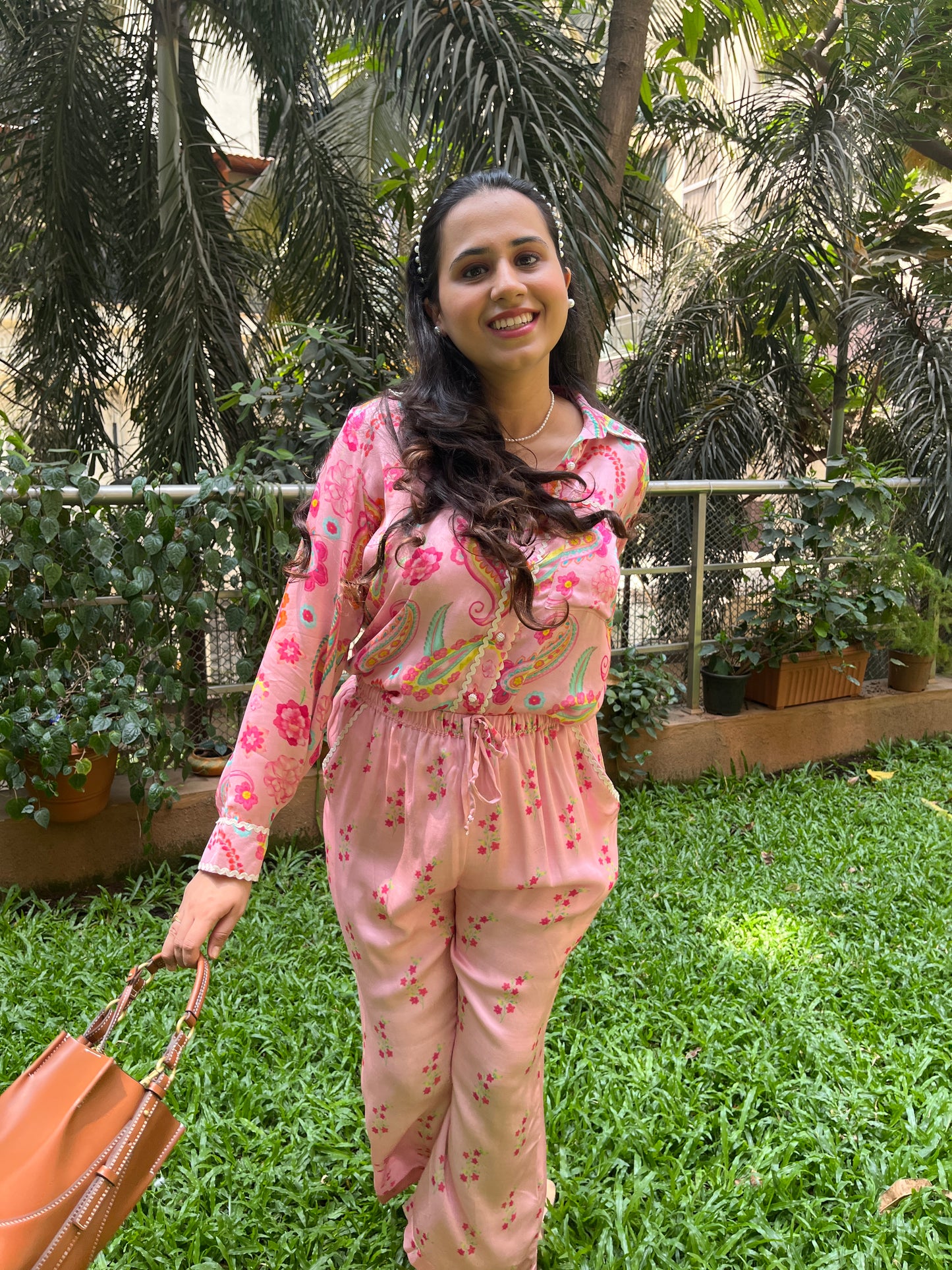 Baby pink paisley printed shirt and floral printed pants with intricate lace detailing