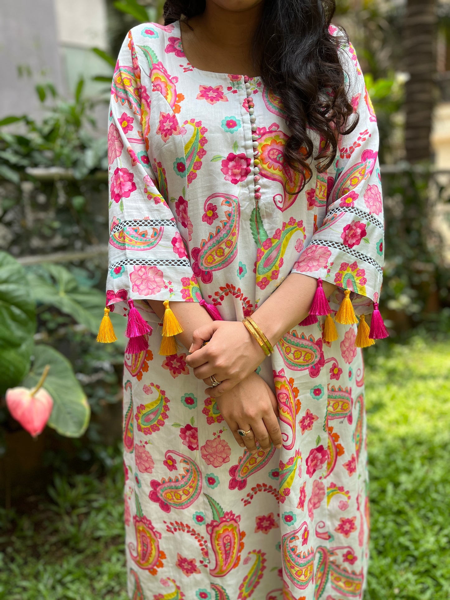 Ice blue paisley printed kurta with colorful lace detailing and pyjama pants