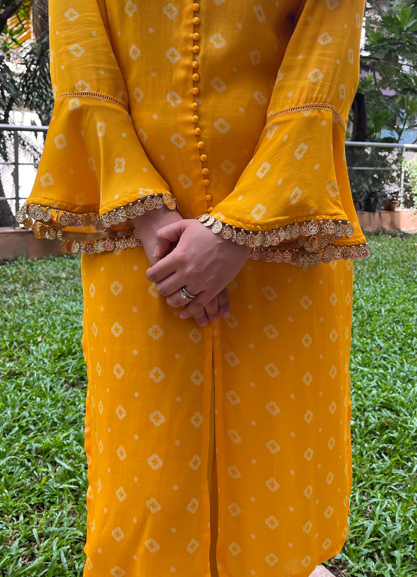 Geometric floral yellow kurta and pyjama set with gold coin detailing