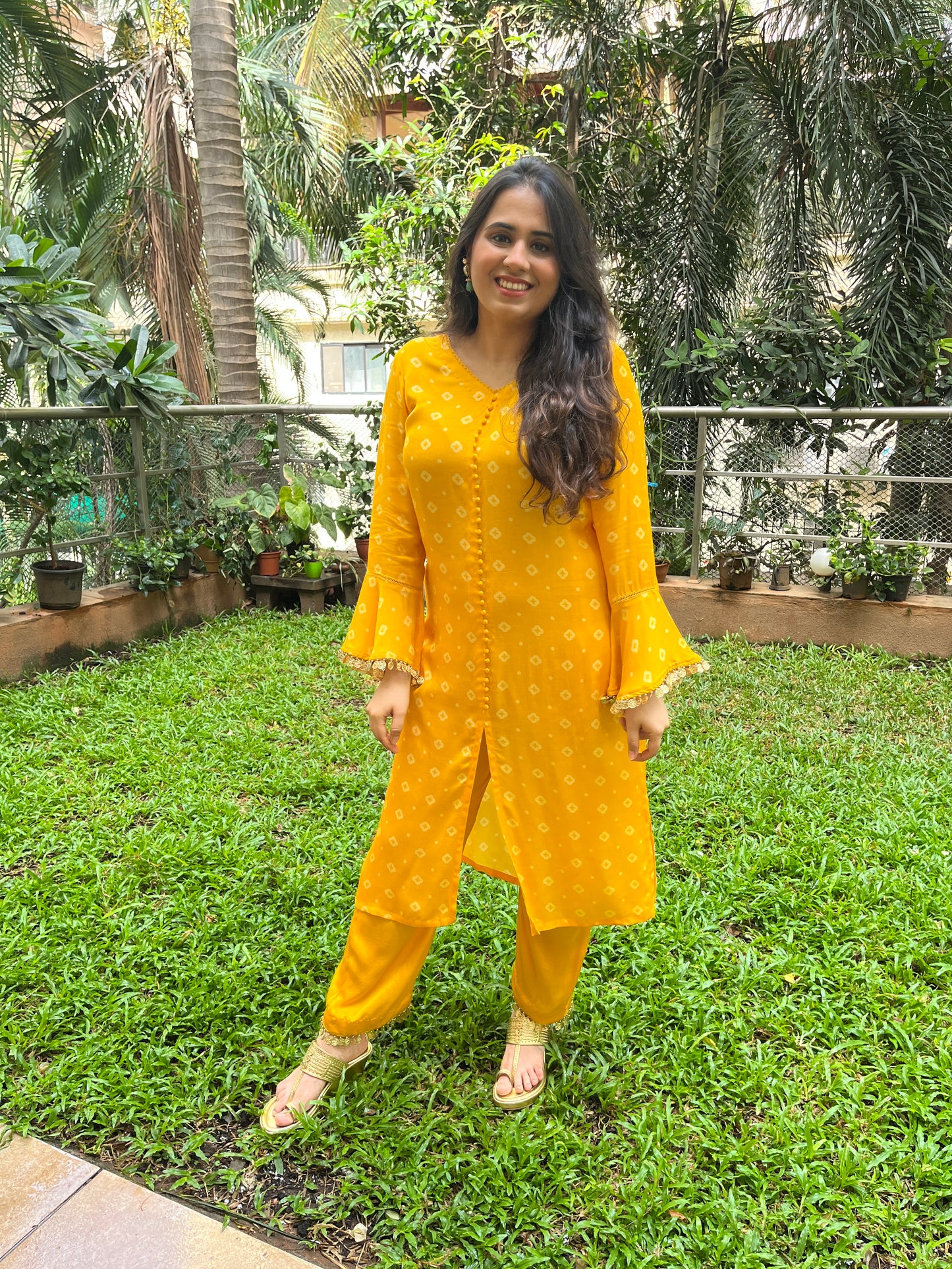 Geometric floral yellow kurta and pyjama set with gold coin detailing