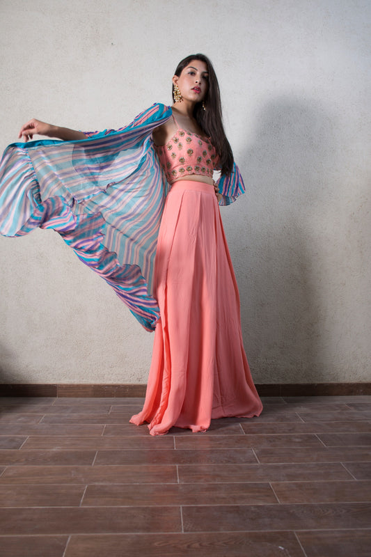 Hand embroidered pink blouse and palazzos with a stripe ruffle cape