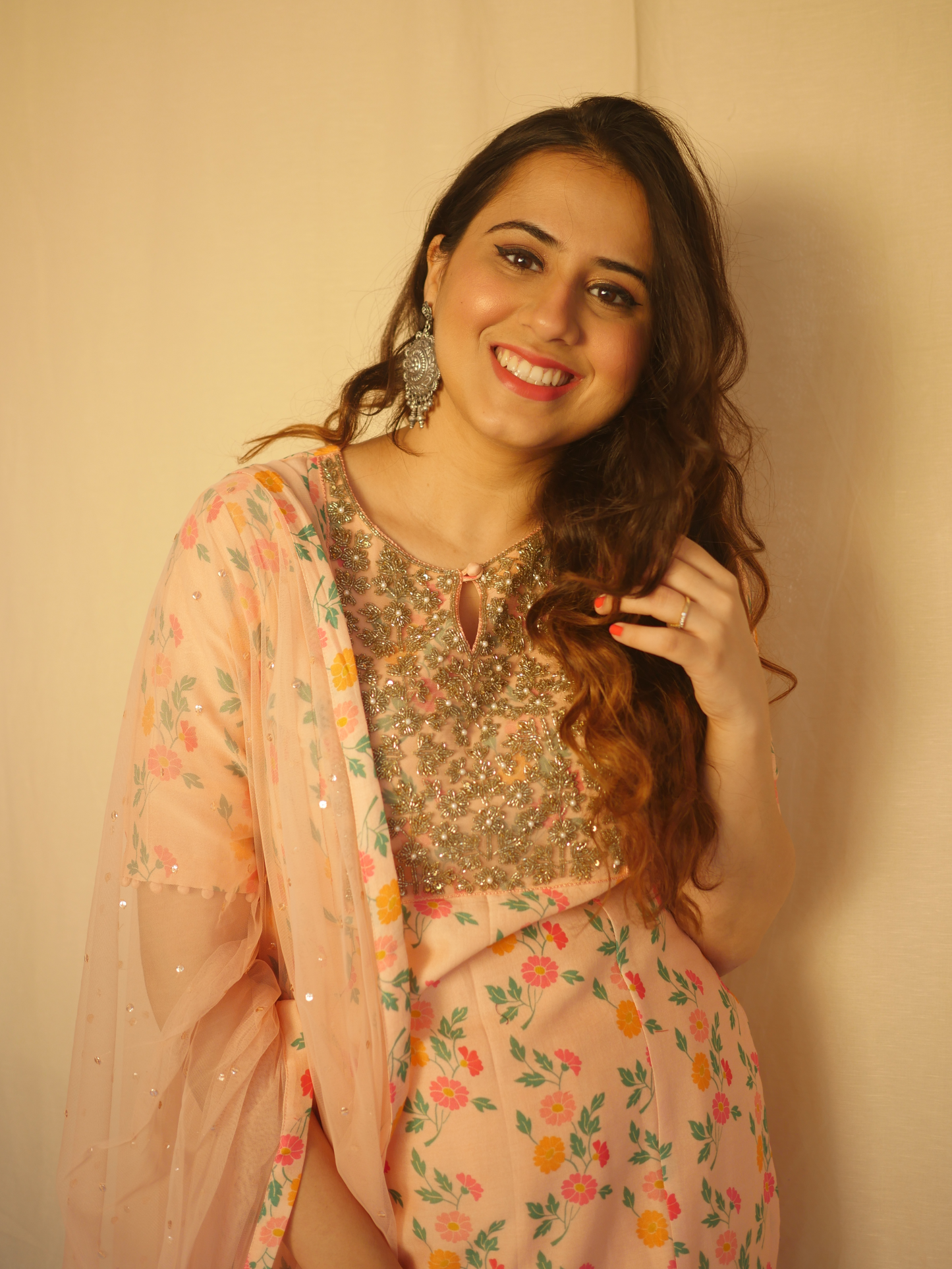 Baby pink floral printed kurta with a hand embroidered yoke, pyjama and dupatta