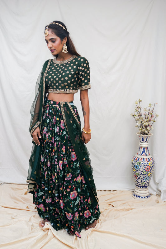 Bottle green hand embroidered blouse and dupatta with a high waisted floral printed lehenga