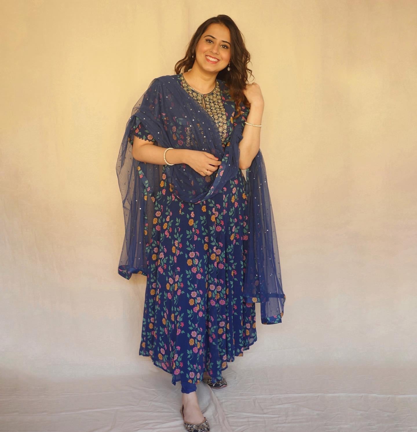 Navy blue floral printed anarkali with a hand embroidered yoke, dupatta and churidaar