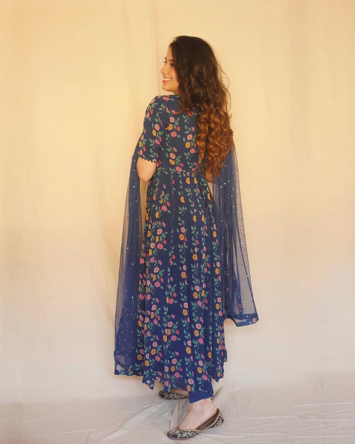 Navy blue floral printed anarkali with a hand embroidered yoke, dupatta and churidaar