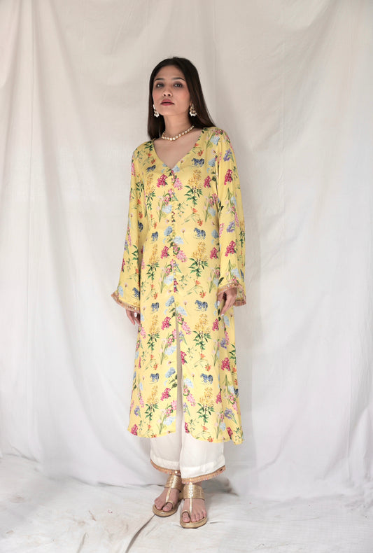 Floral printed yellow kurta and cream pyjama with colourful lace detailing