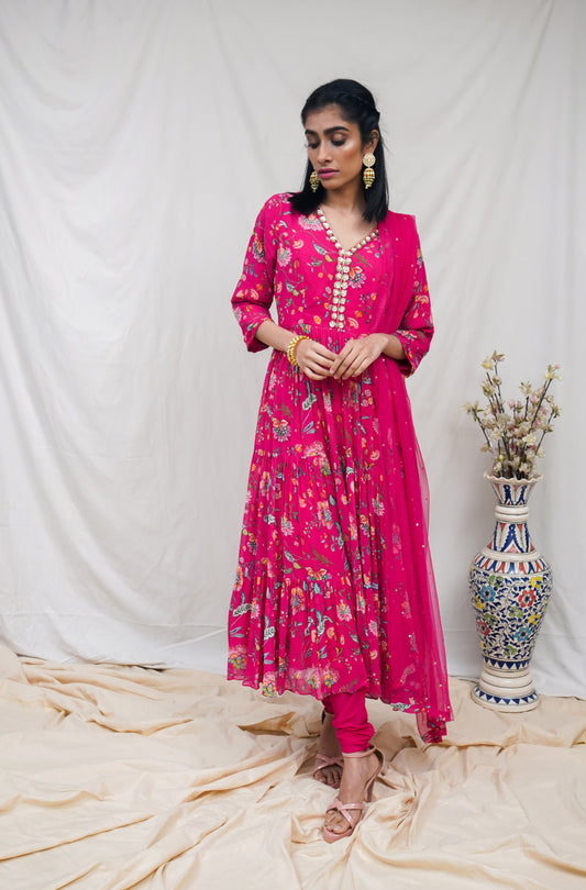 Rani pink layered anarkali set with an embroidered yoke and dupatta