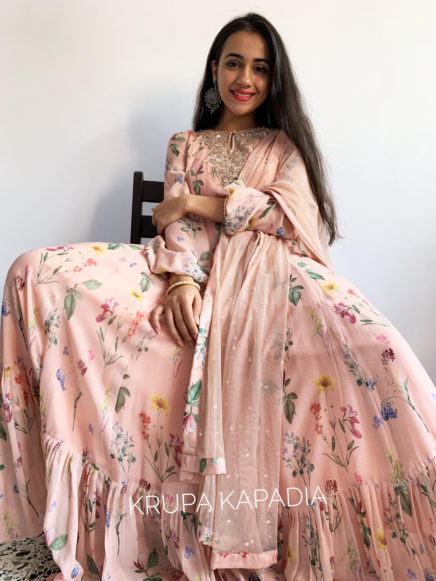 Peach floral printed anarkali with a hand embroidered yoke and dupatta