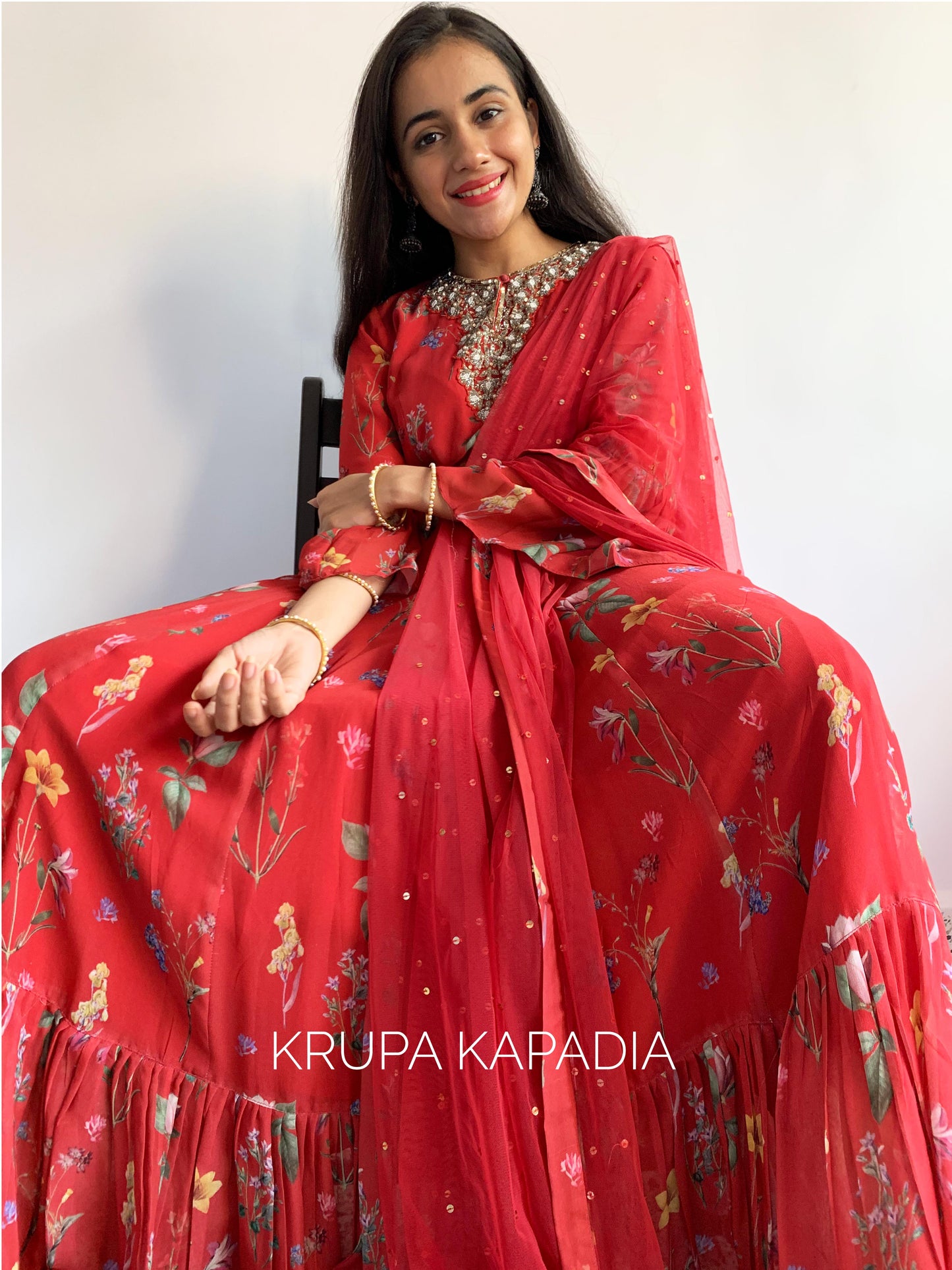 Red floral printed ruffle anarkali with a hand embroidered yoke and dupatta