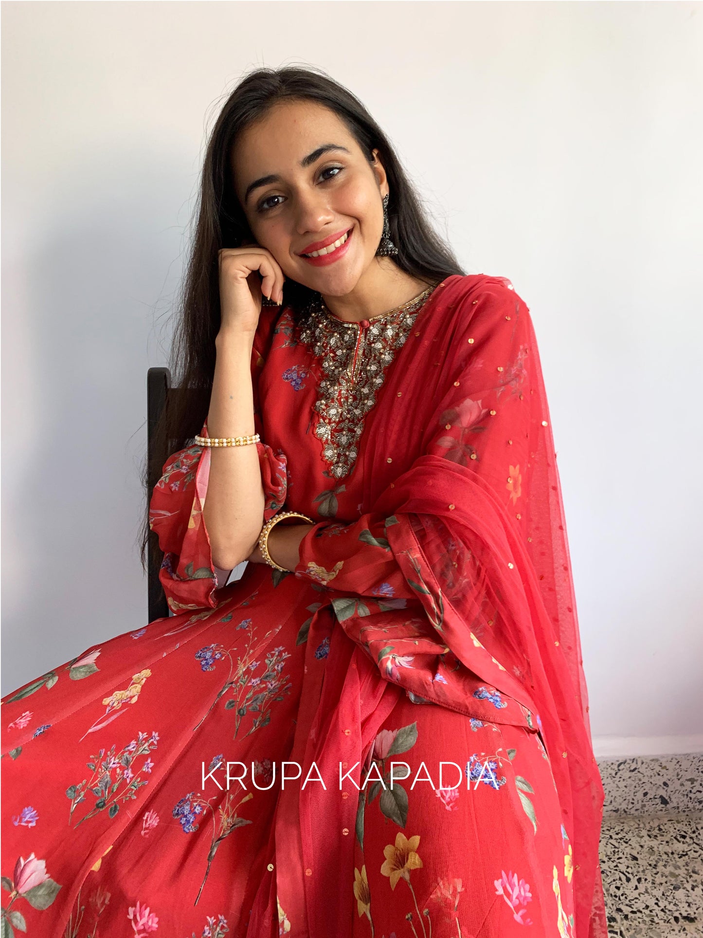 Red floral printed ruffle anarkali with a hand embroidered yoke and dupatta