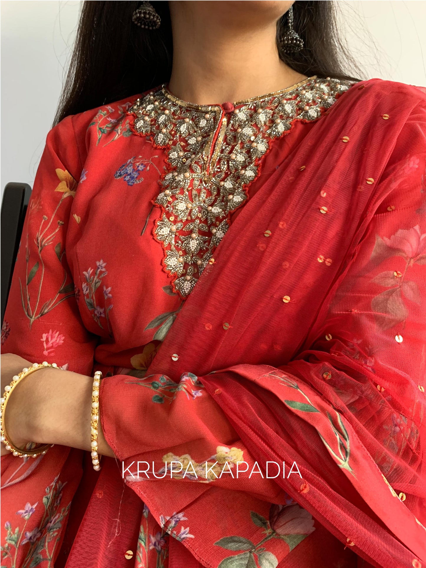 Red floral printed ruffle anarkali with a hand embroidered yoke and dupatta